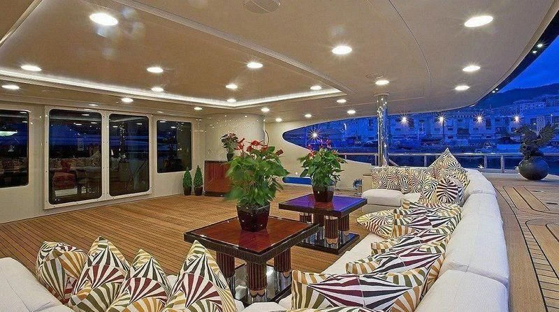 a living room with a large window aboard AUSTRALIA Yacht for Sale