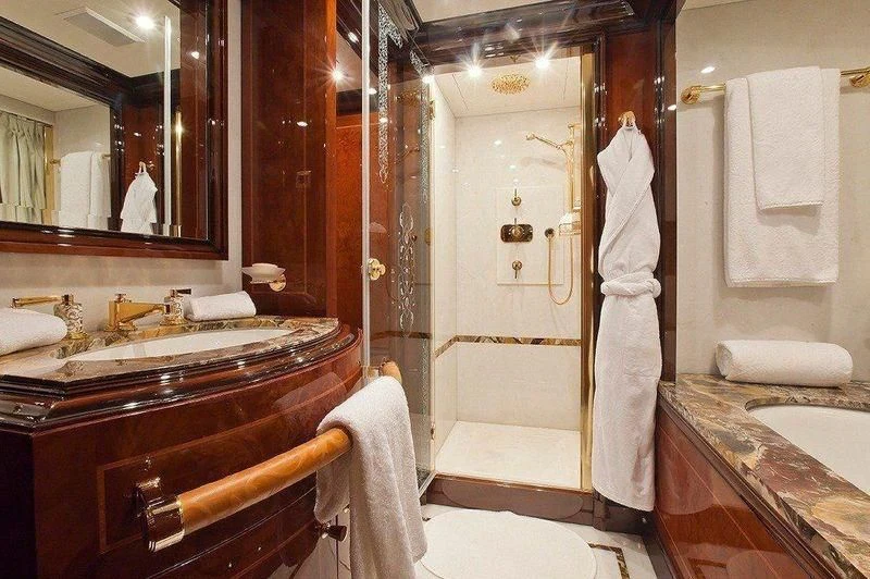 a bathroom with a large mirror aboard AUSTRALIA Yacht for Sale