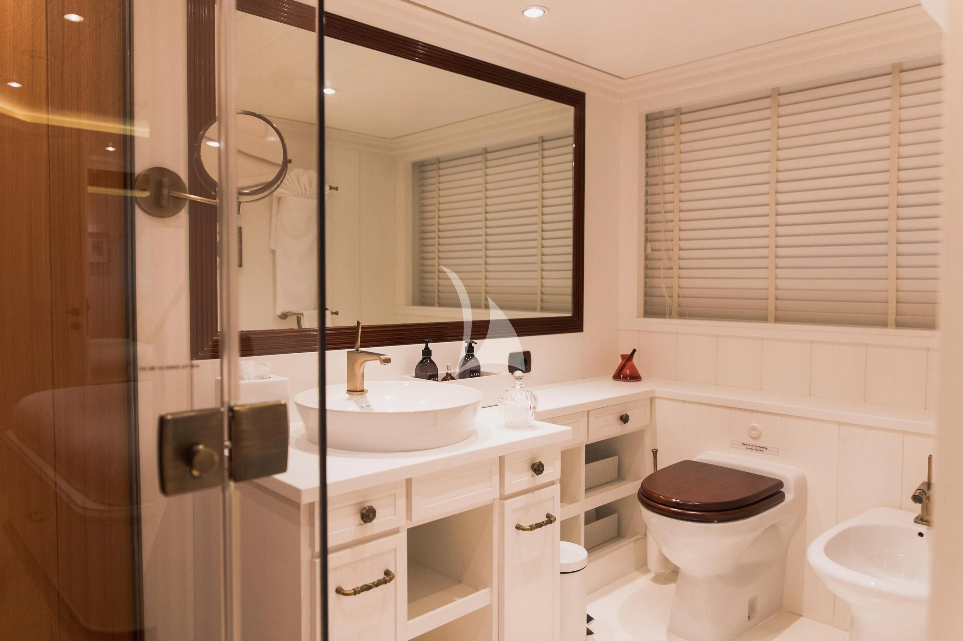 a bathroom with a toilet and a sink aboard LADY TRUDY Yacht for Charter