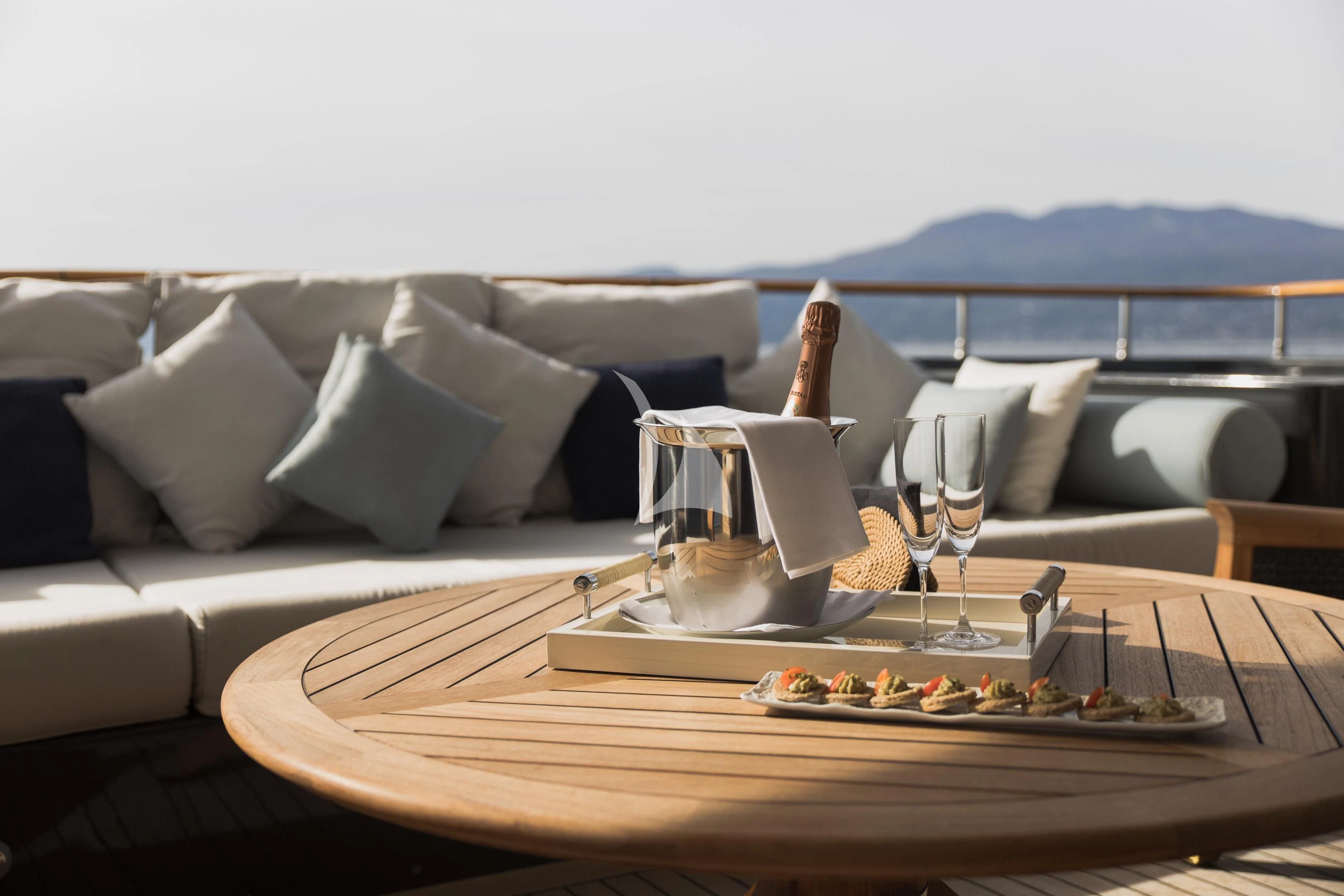a table with food and drinks on it aboard LADY TRUDY Yacht for Charter
