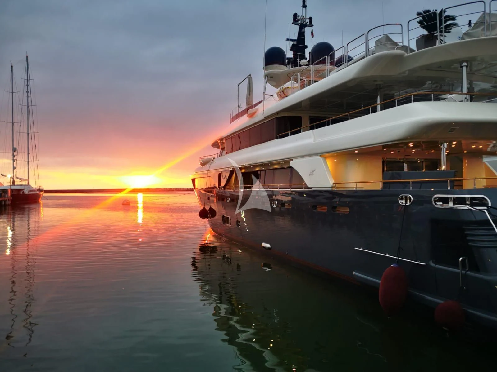a boat docked at sunset aboard LADY TRUDY Yacht for Charter