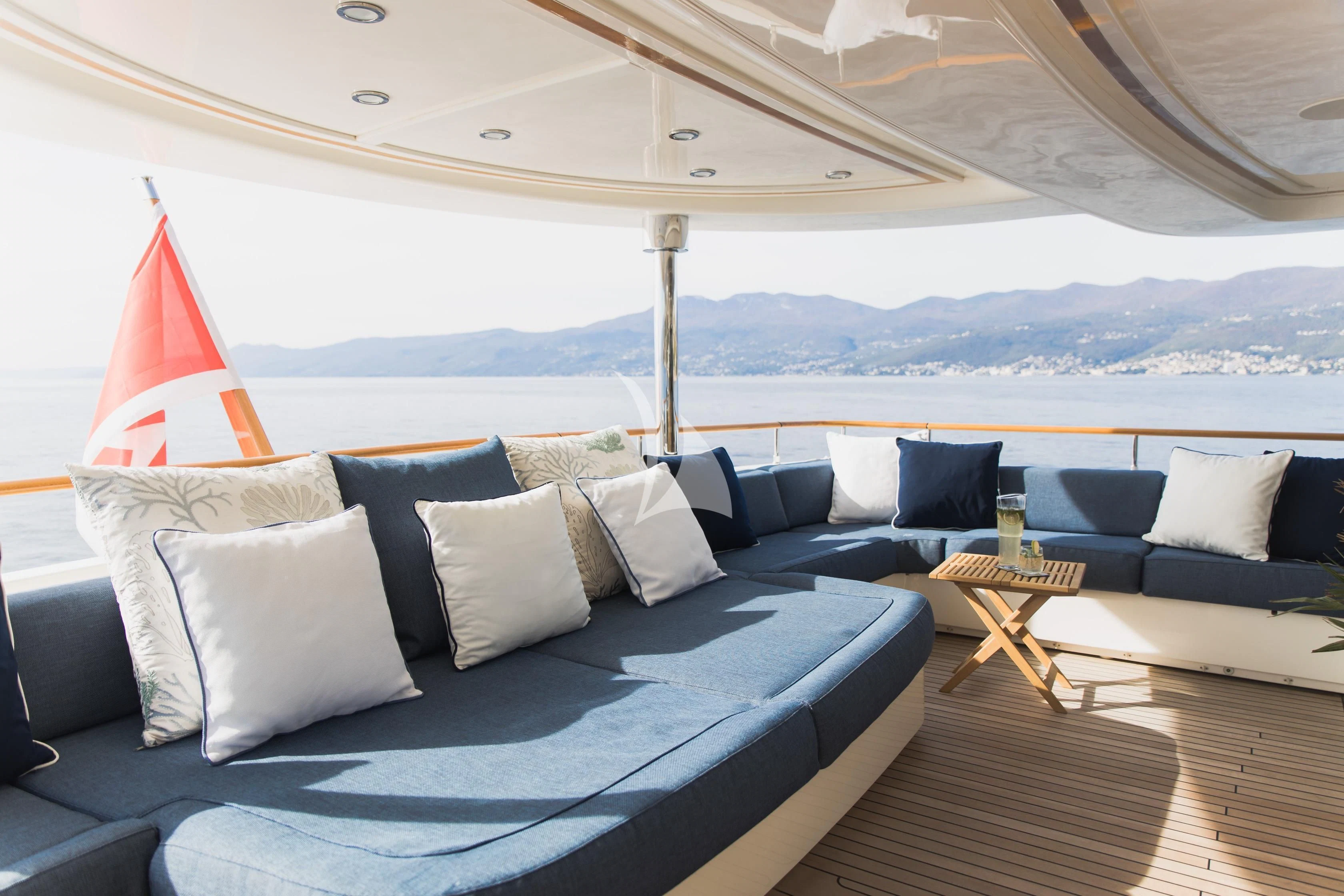 a large bed with pillows aboard LADY TRUDY Yacht for Charter