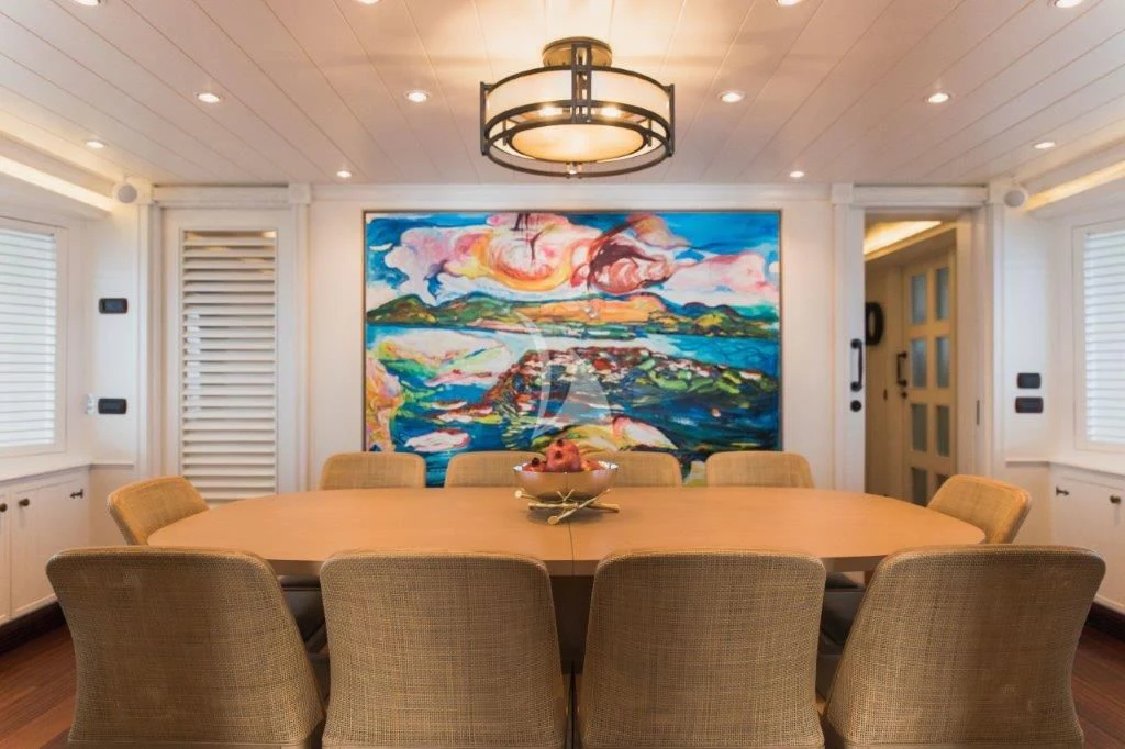 a large room with a large painting aboard LADY TRUDY Yacht for Charter
