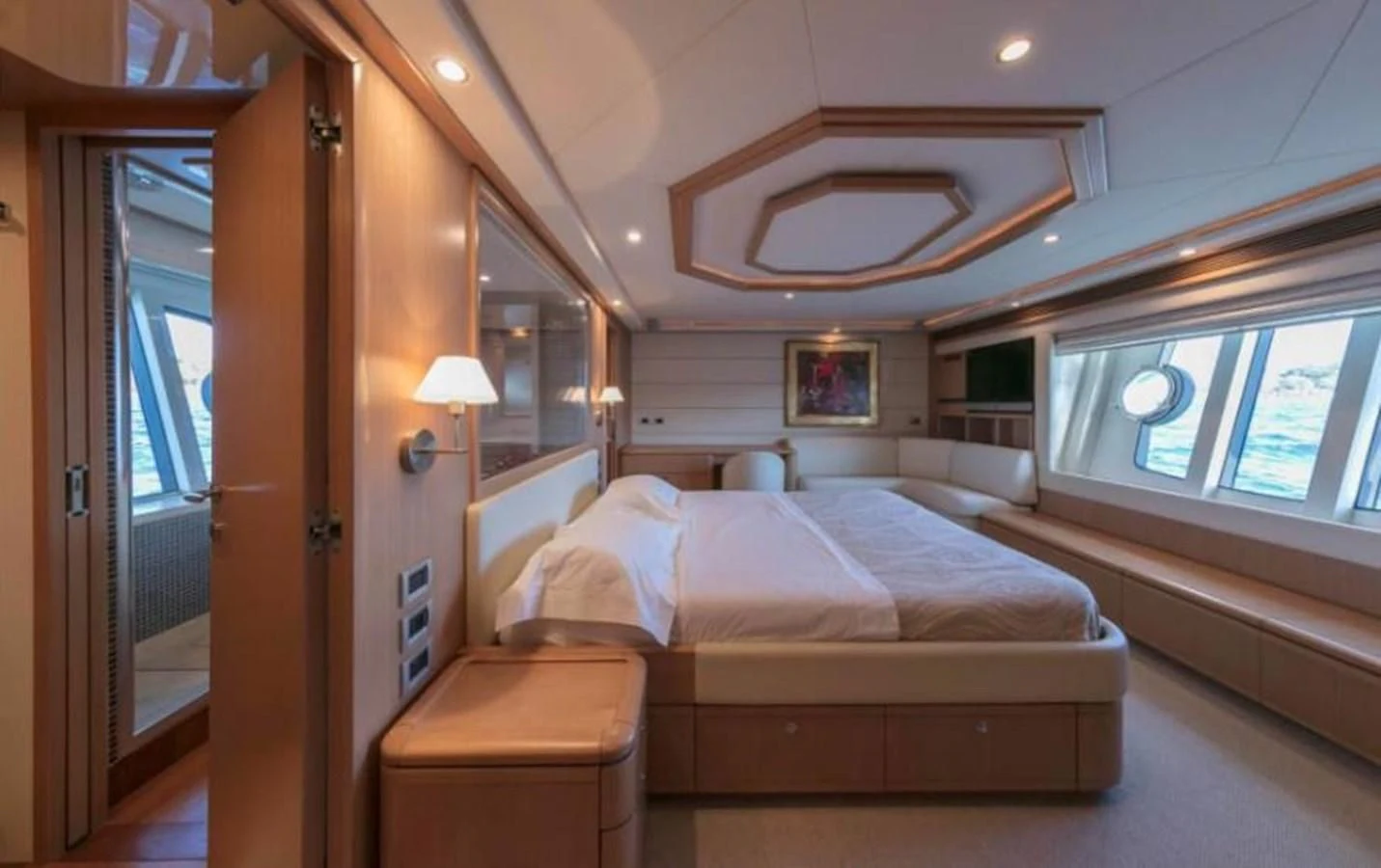 a room with a bed and a window aboard FAIR LADY SILVIA Yacht for Sale