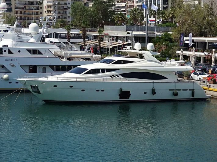 a yacht docked at a pier aboard FAIR LADY SILVIA Yacht for Sale
