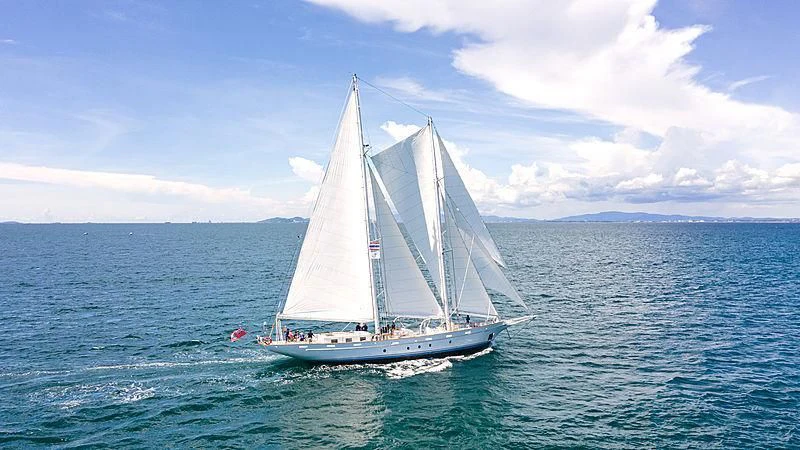 a sailboat in the water aboard VELA Yacht for Sale
