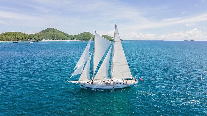 a sailboat on the water aboard VELA Yacht for Sale
