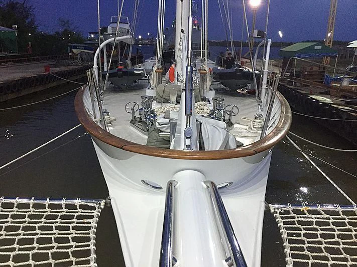 a boat on a dock aboard VELA Yacht for Sale