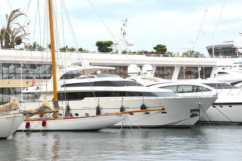 a group of boats in a harbor aboard LA FLEUR Yacht for Sale