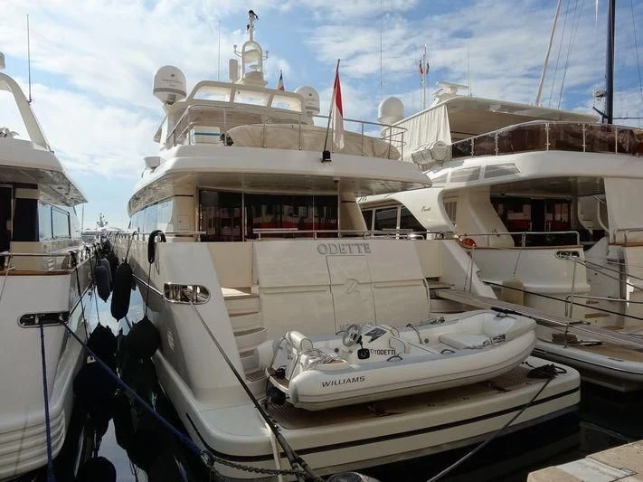 a boat docked at a pier aboard LA FLEUR Yacht for Sale