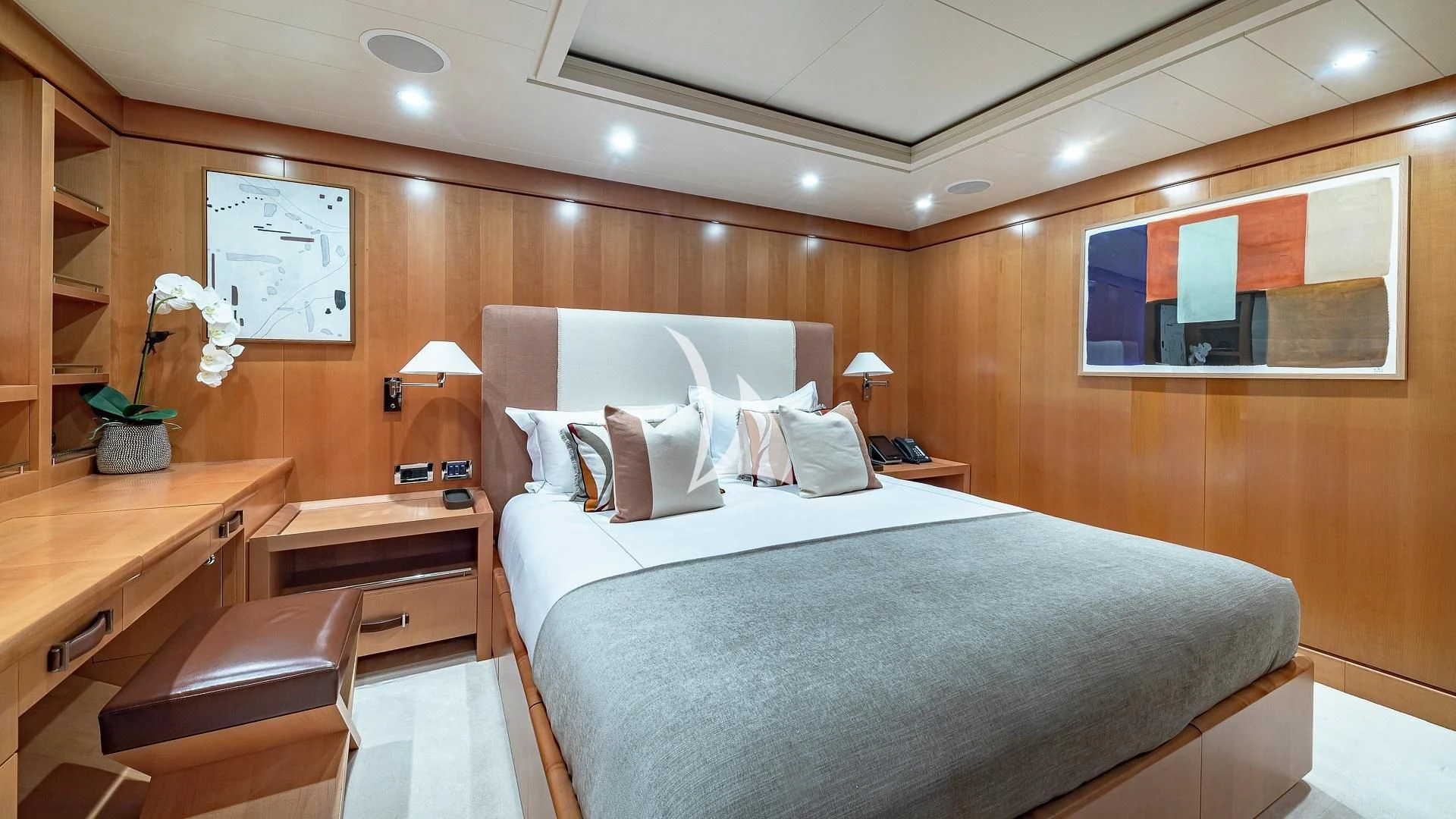 a bed in a room aboard LIND Yacht for Charter