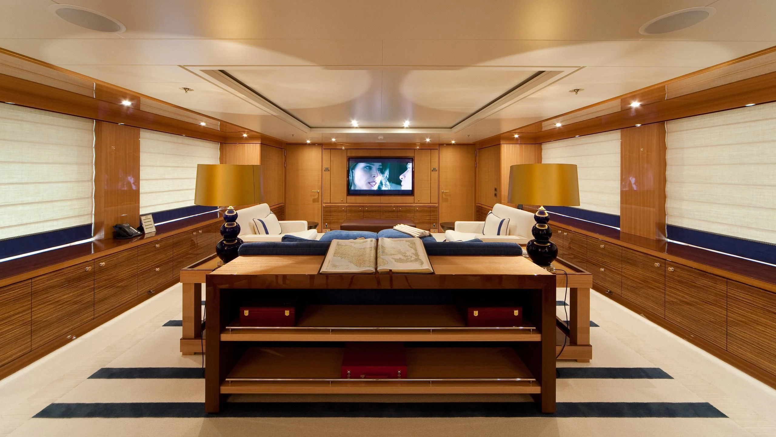 a bed in a room aboard LIND Yacht for Charter