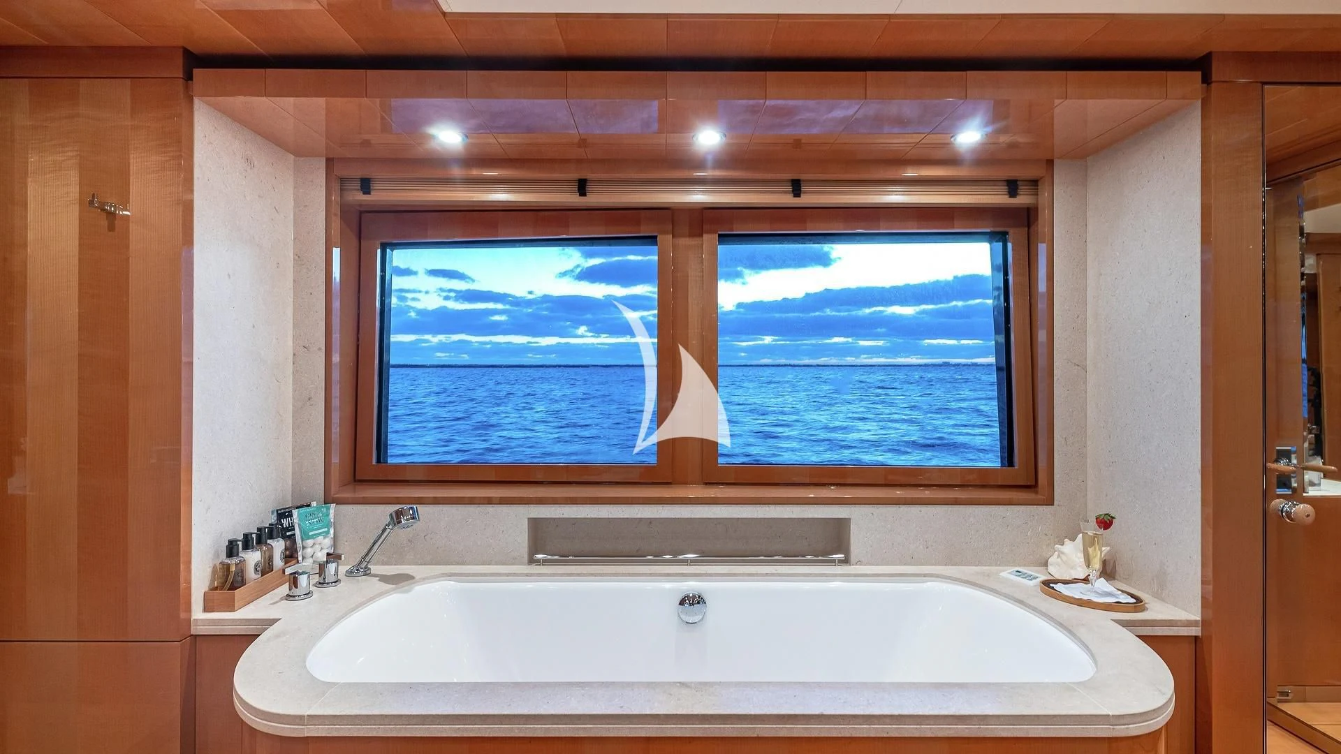 a large window in a bathroom aboard LIND Yacht for Charter