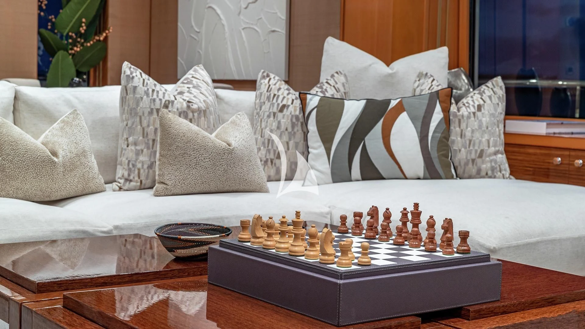 a chess board with a chess board aboard LIND Yacht for Charter