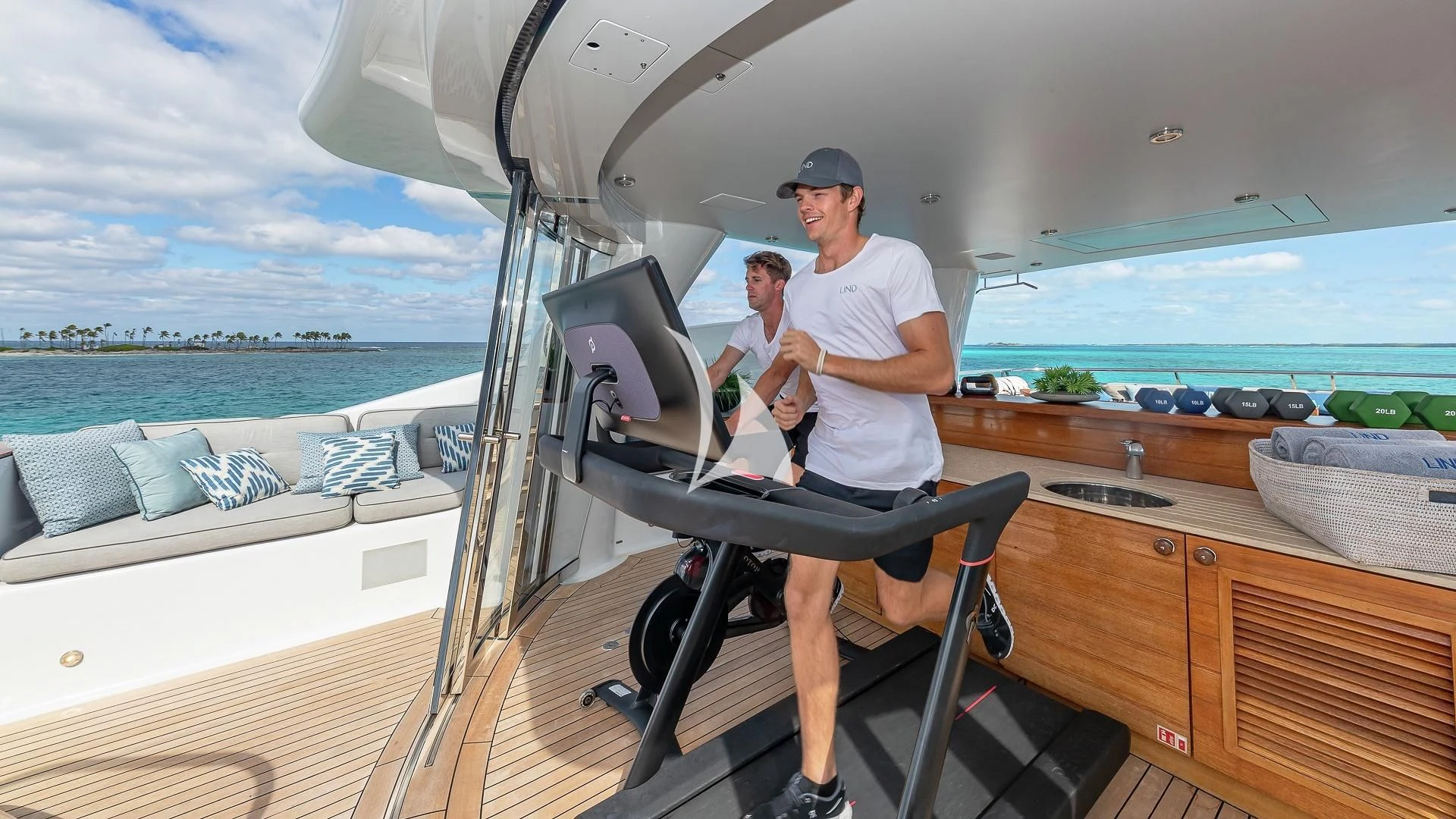 a person on a boat aboard LIND Yacht for Charter