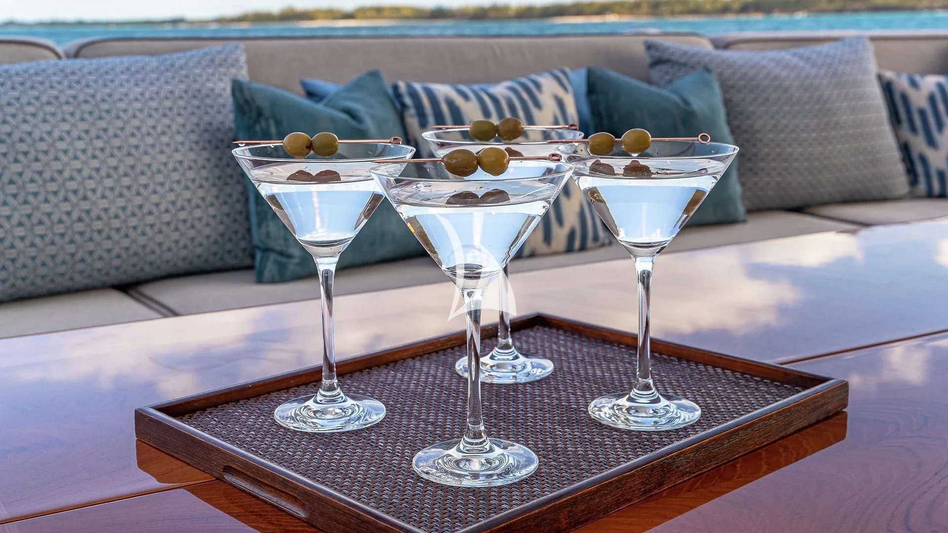 a group of wine glasses on a table aboard LIND Yacht for Charter