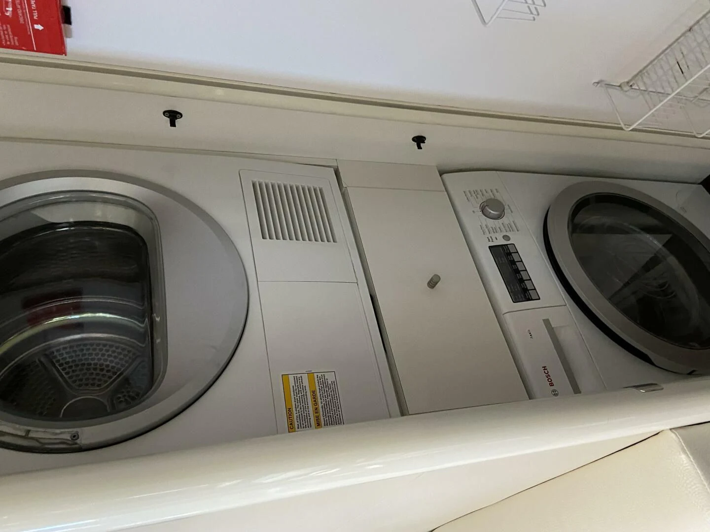 a white rectangular object with a black circle on it aboard BG Yacht for Sale