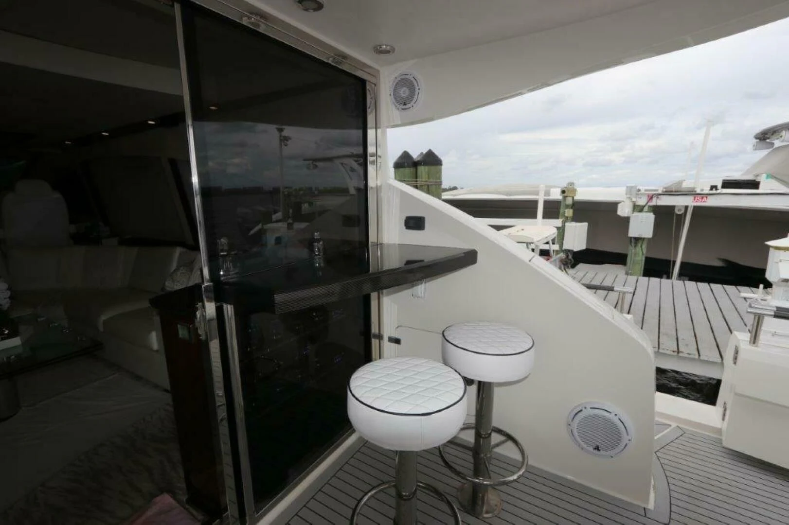 a room with a large mirror and a toilet aboard BG Yacht for Sale