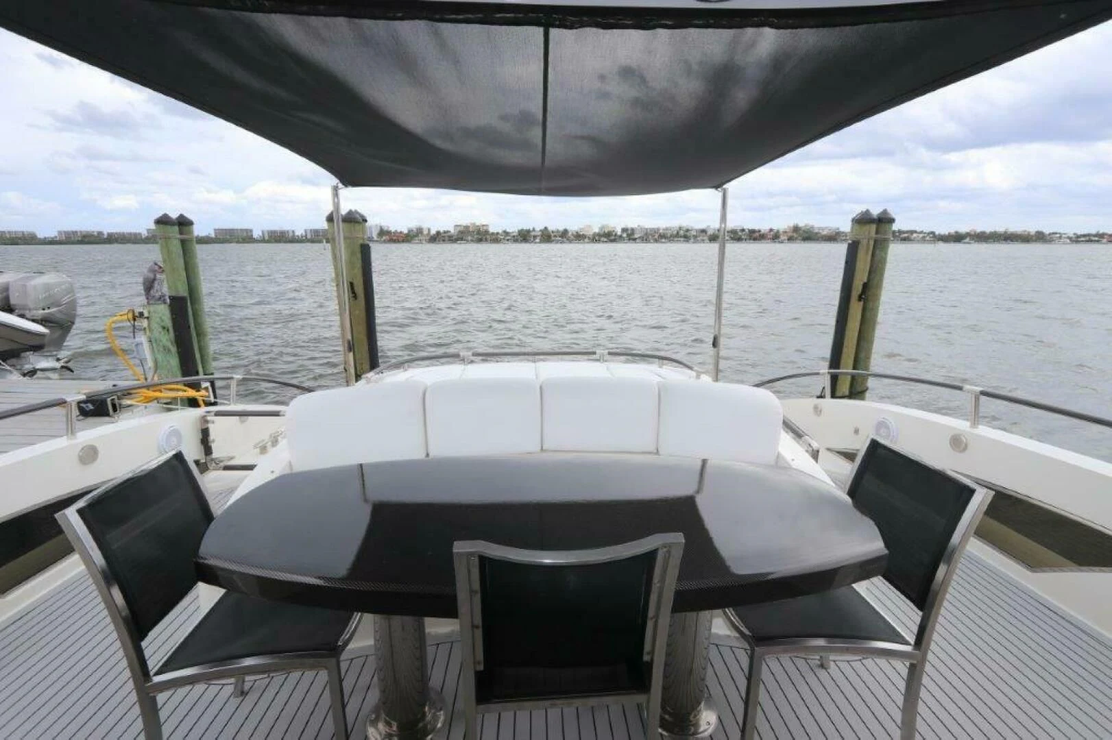 a table and chairs on a boat aboard BG Yacht for Sale