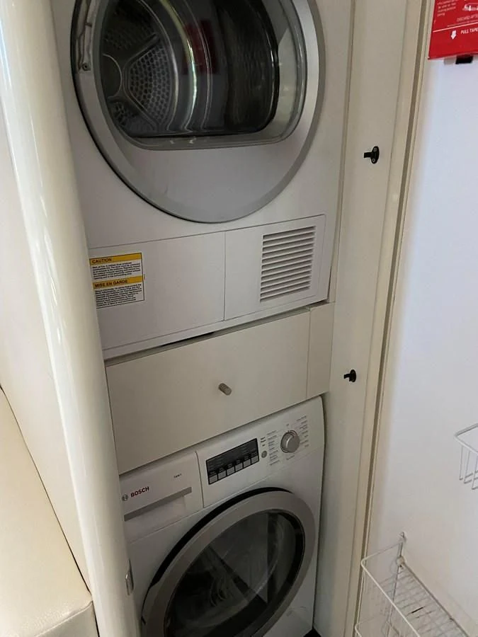 a white washing machine aboard BG Yacht for Sale