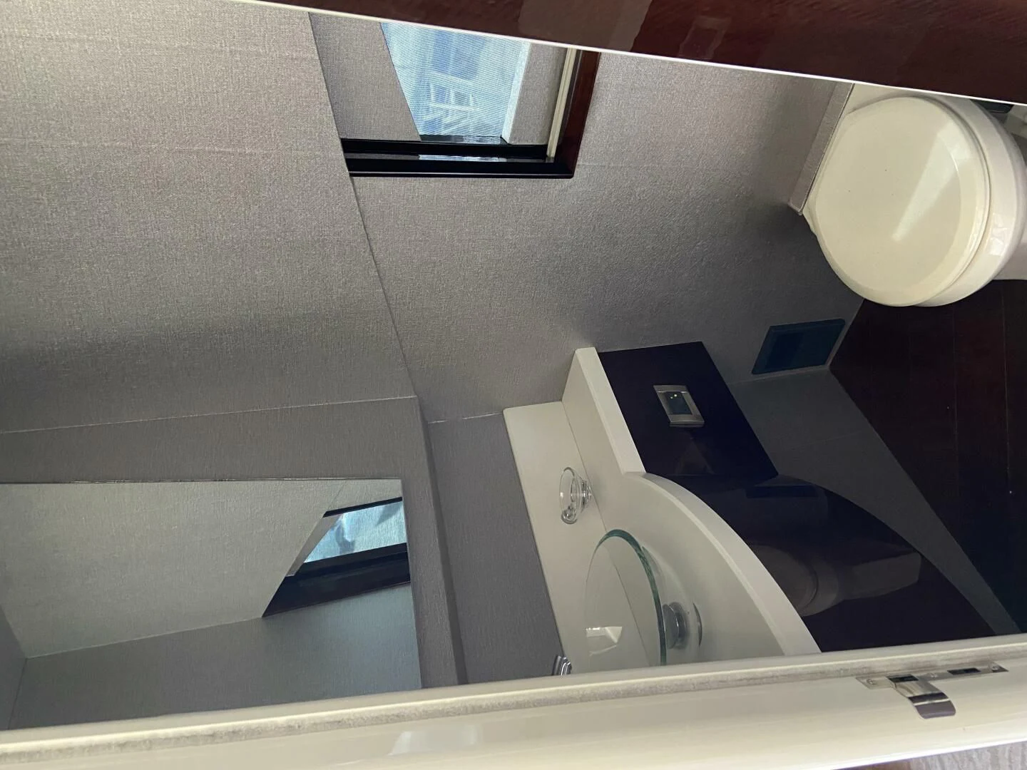 a bathroom with a sink and a mirror aboard BG Yacht for Sale