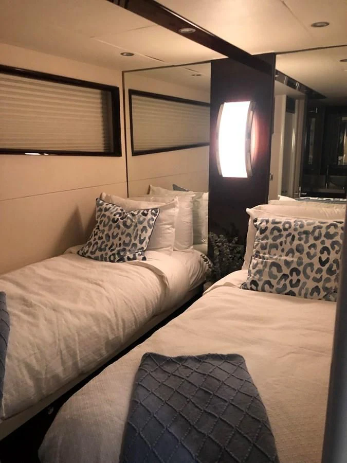 a couple of beds in a room aboard BG Yacht for Sale