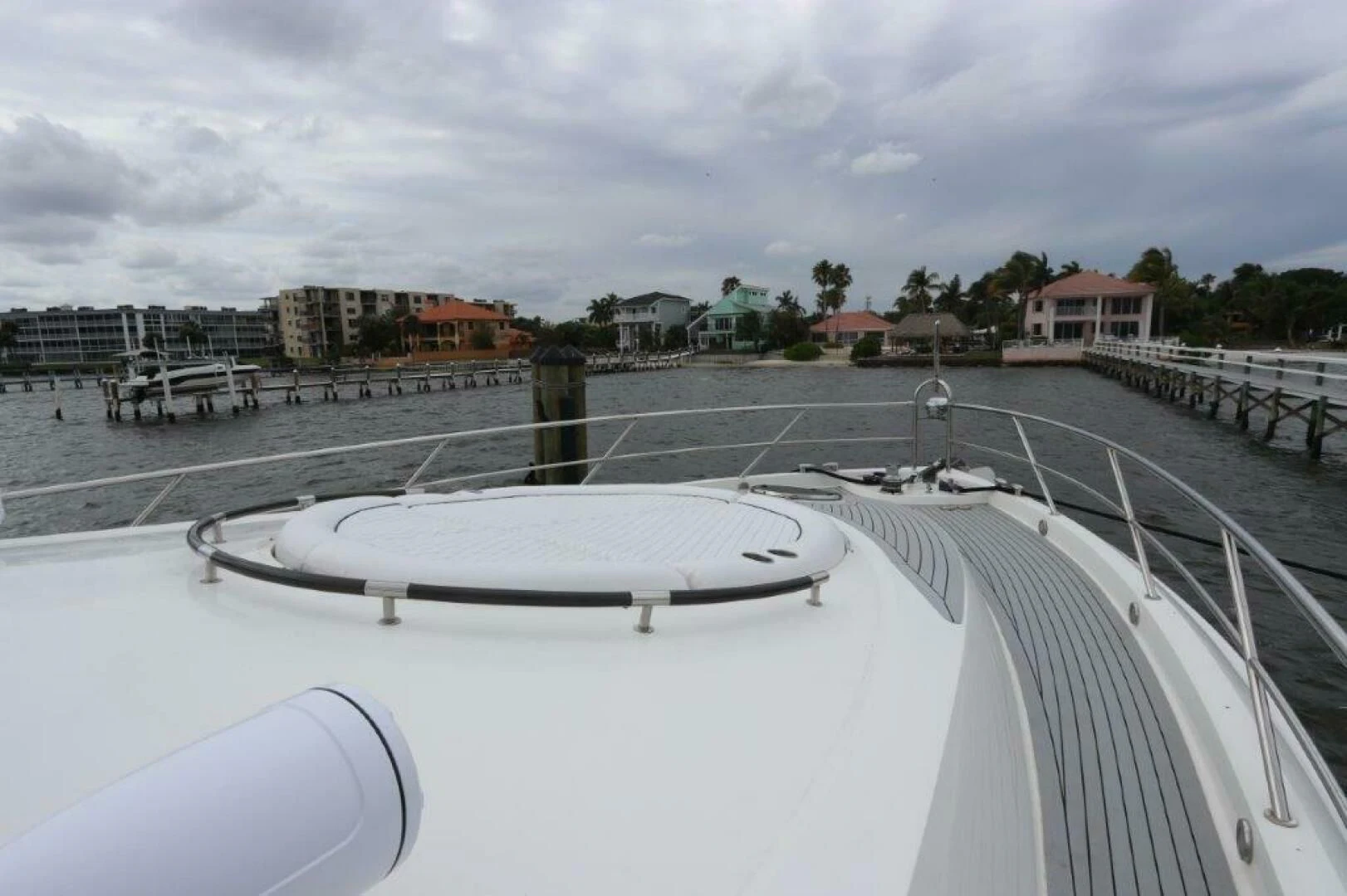 a large white pool with a water slide in the middle aboard BG Yacht for Sale