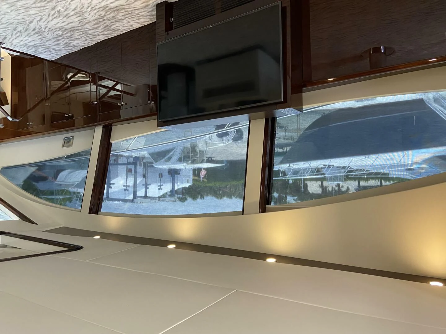 a large glass window aboard BG Yacht for Sale