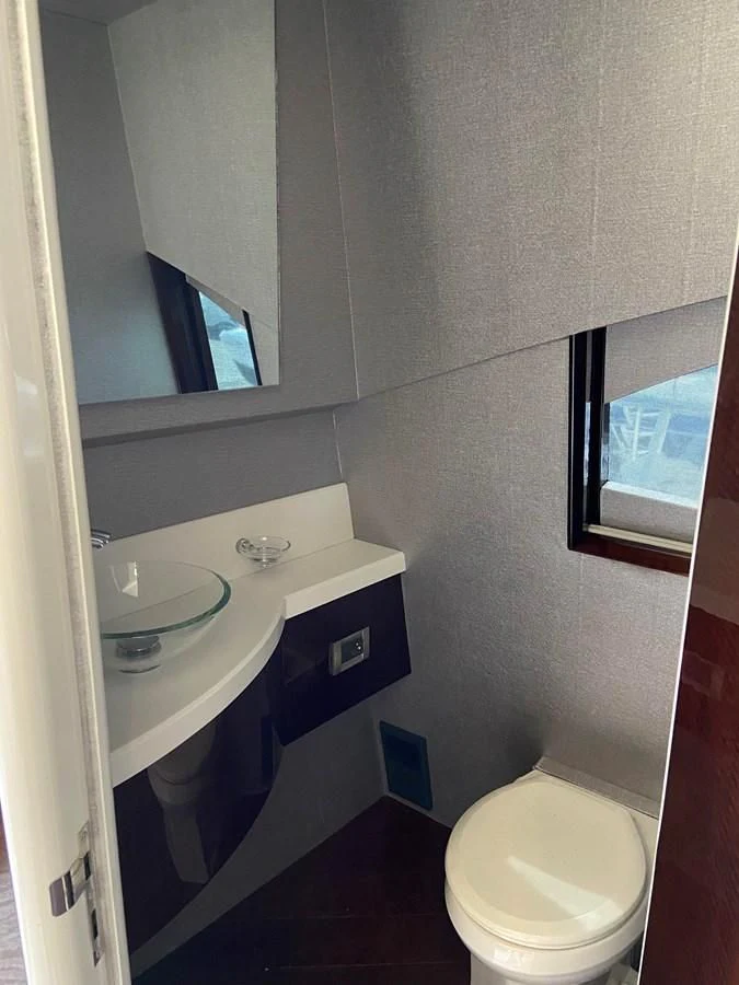 a bathroom with a sink and a toilet aboard BG Yacht for Sale