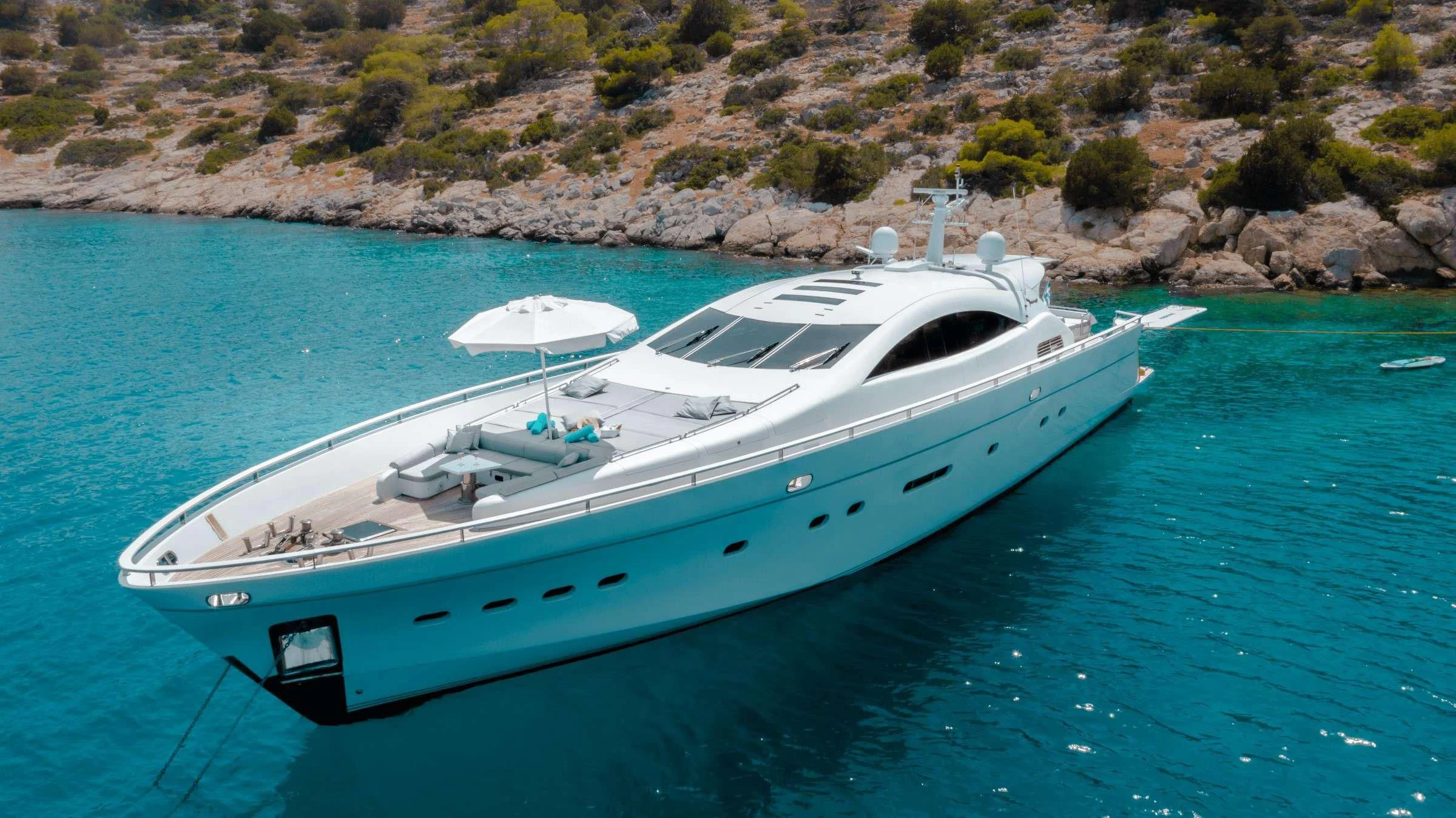 a white boat in the water aboard MAC Yacht for Sale