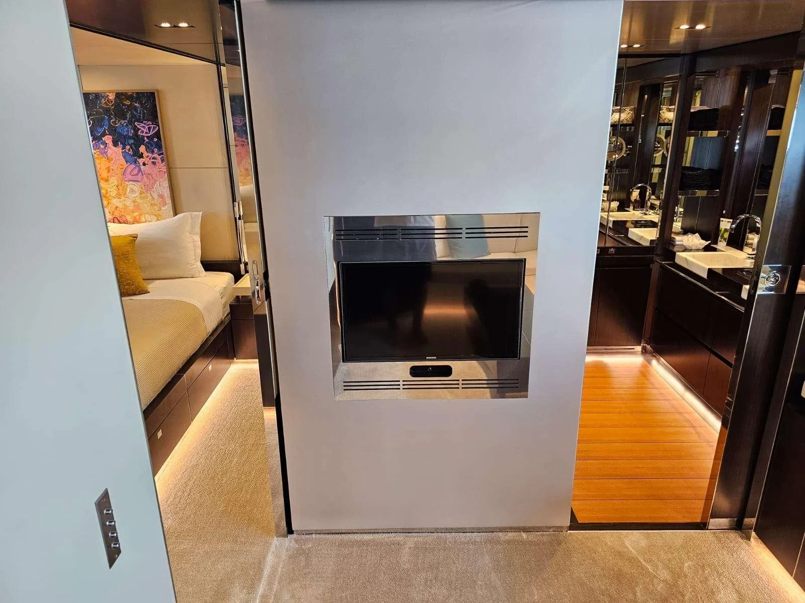 a tv in a room aboard MAC Yacht for Sale