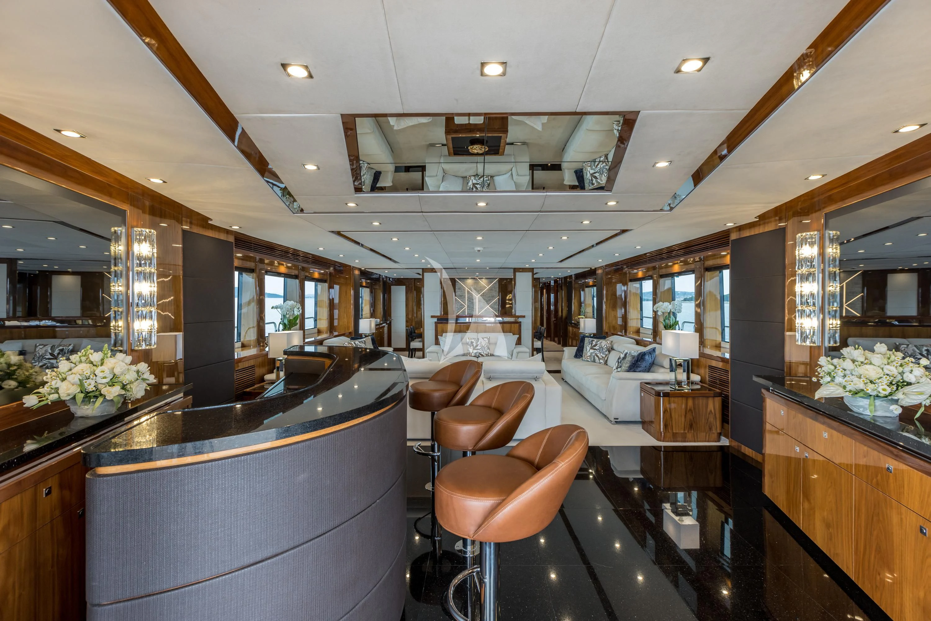 a bar with a bar and chairs aboard KATARIINA I Yacht for Sale