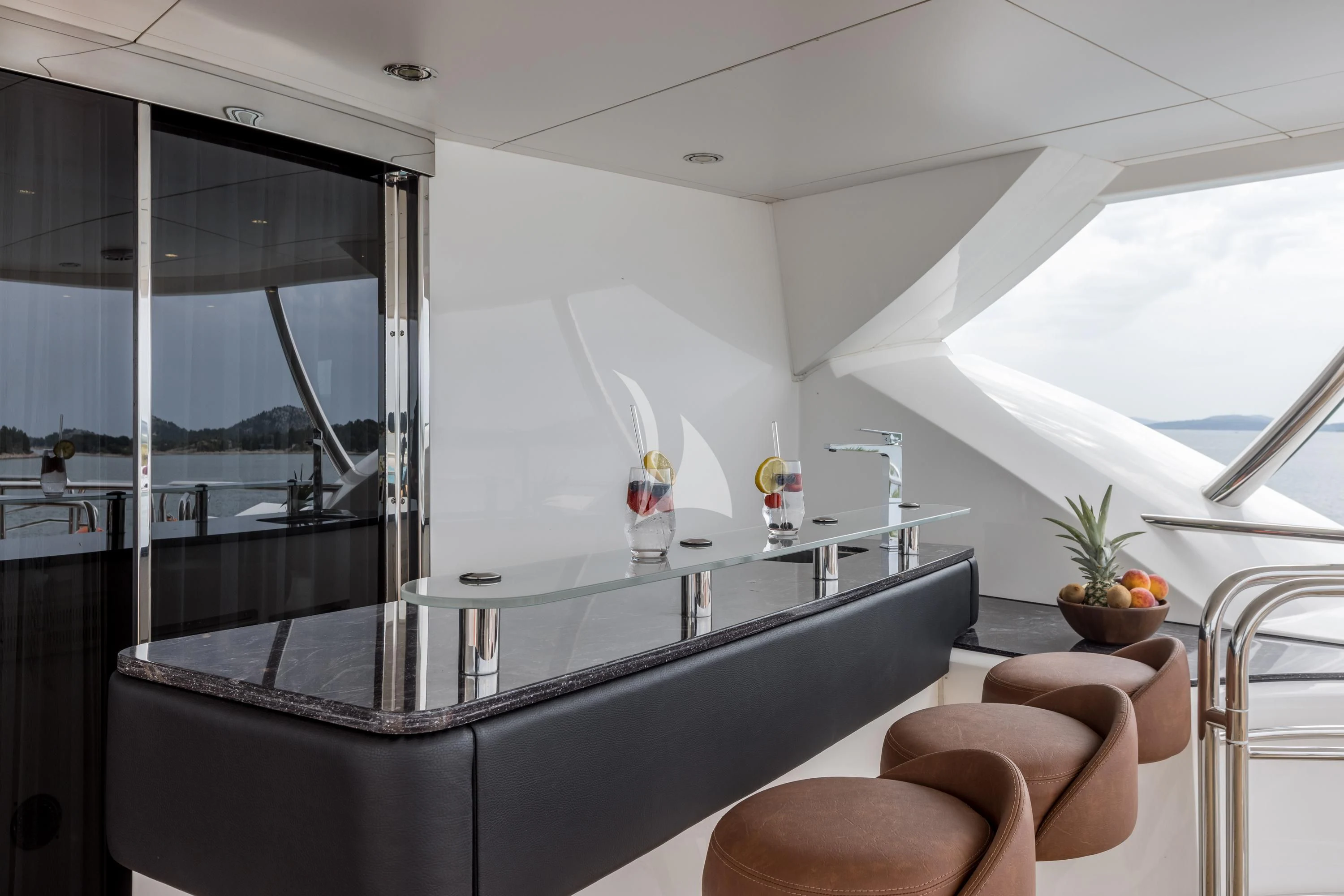a modern kitchen with glass walls aboard KATARIINA I Yacht for Sale