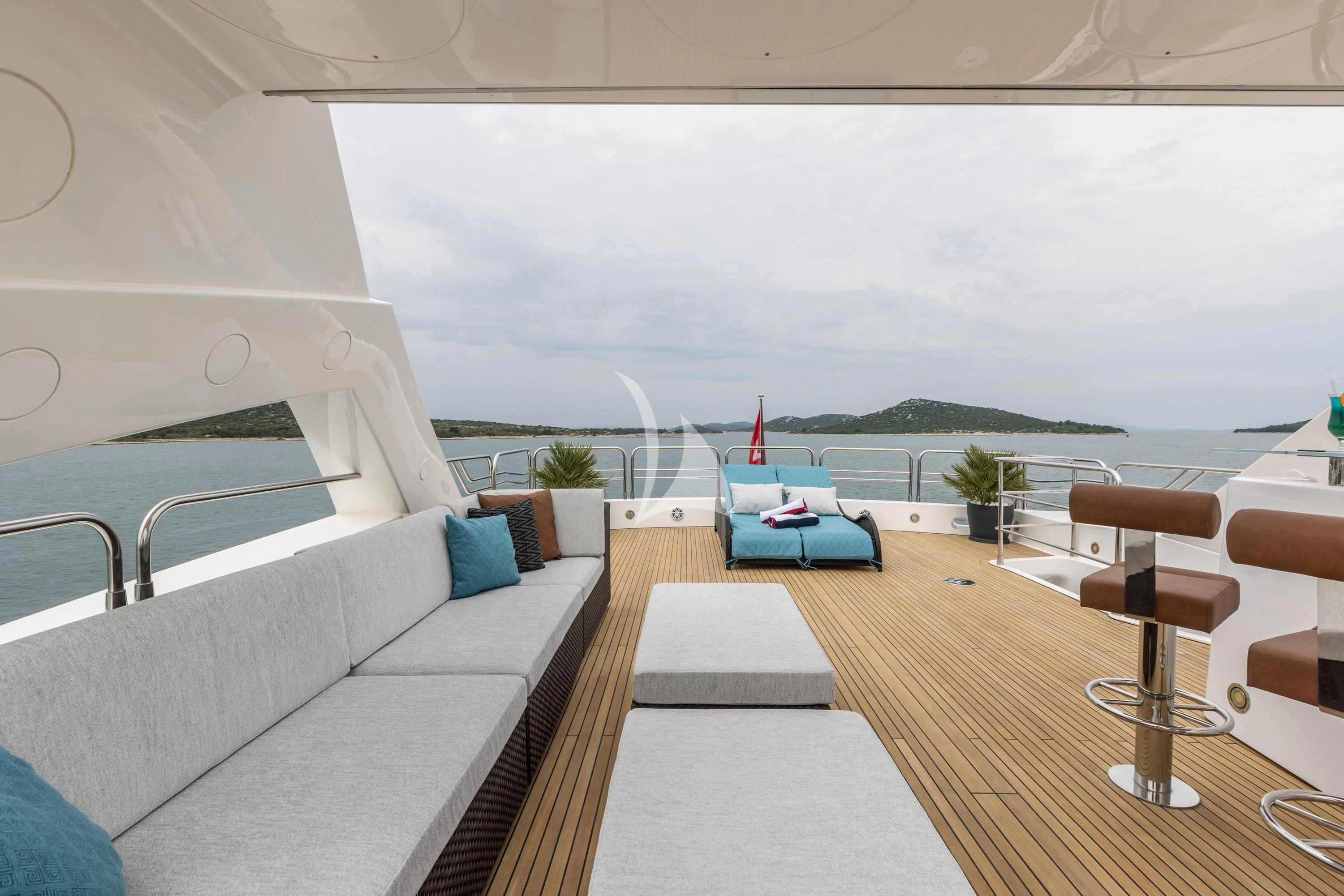 a room with a couch and a pool aboard KATARIINA I Yacht for Sale