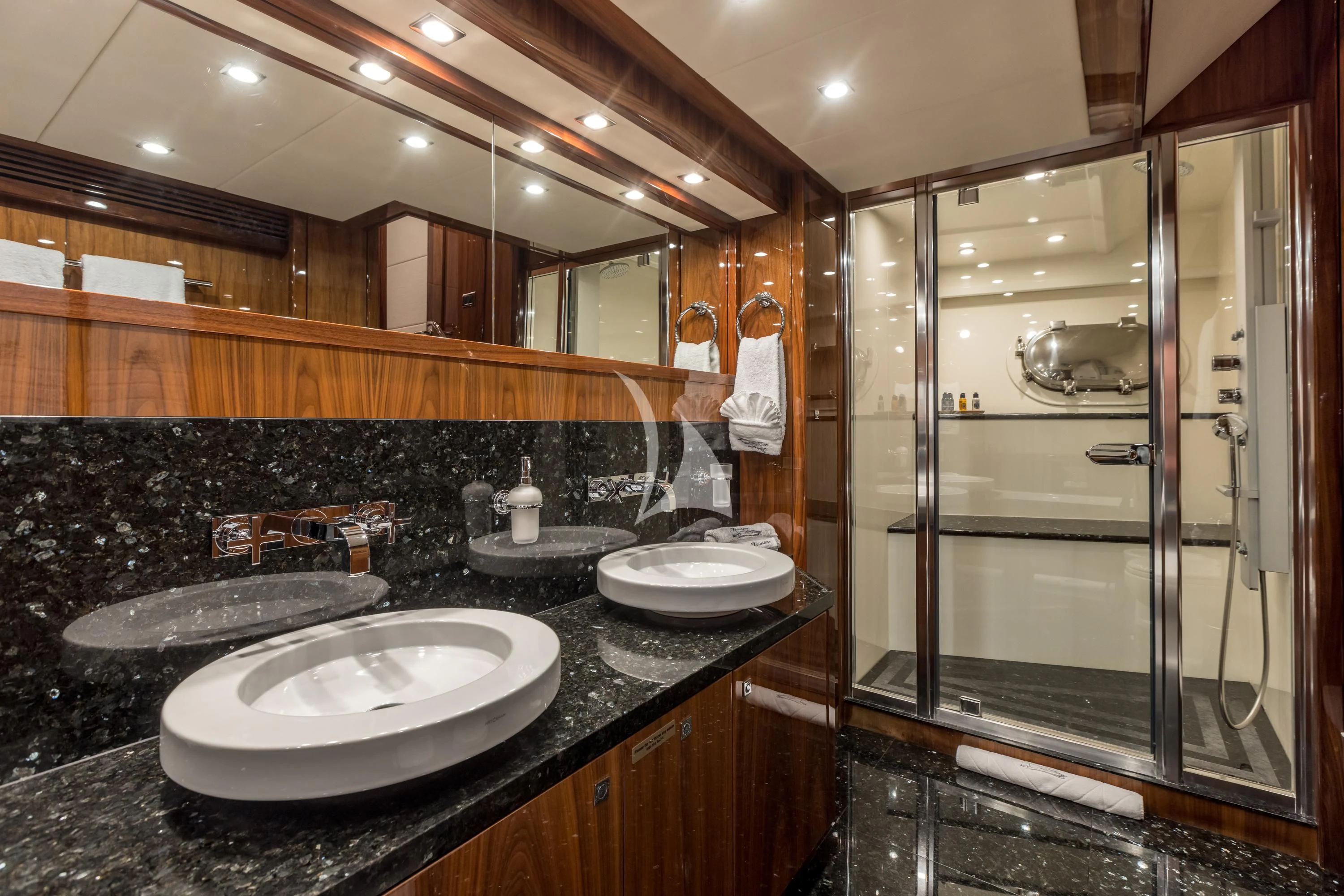 a bathroom with a glass shower aboard KATARIINA I Yacht for Sale