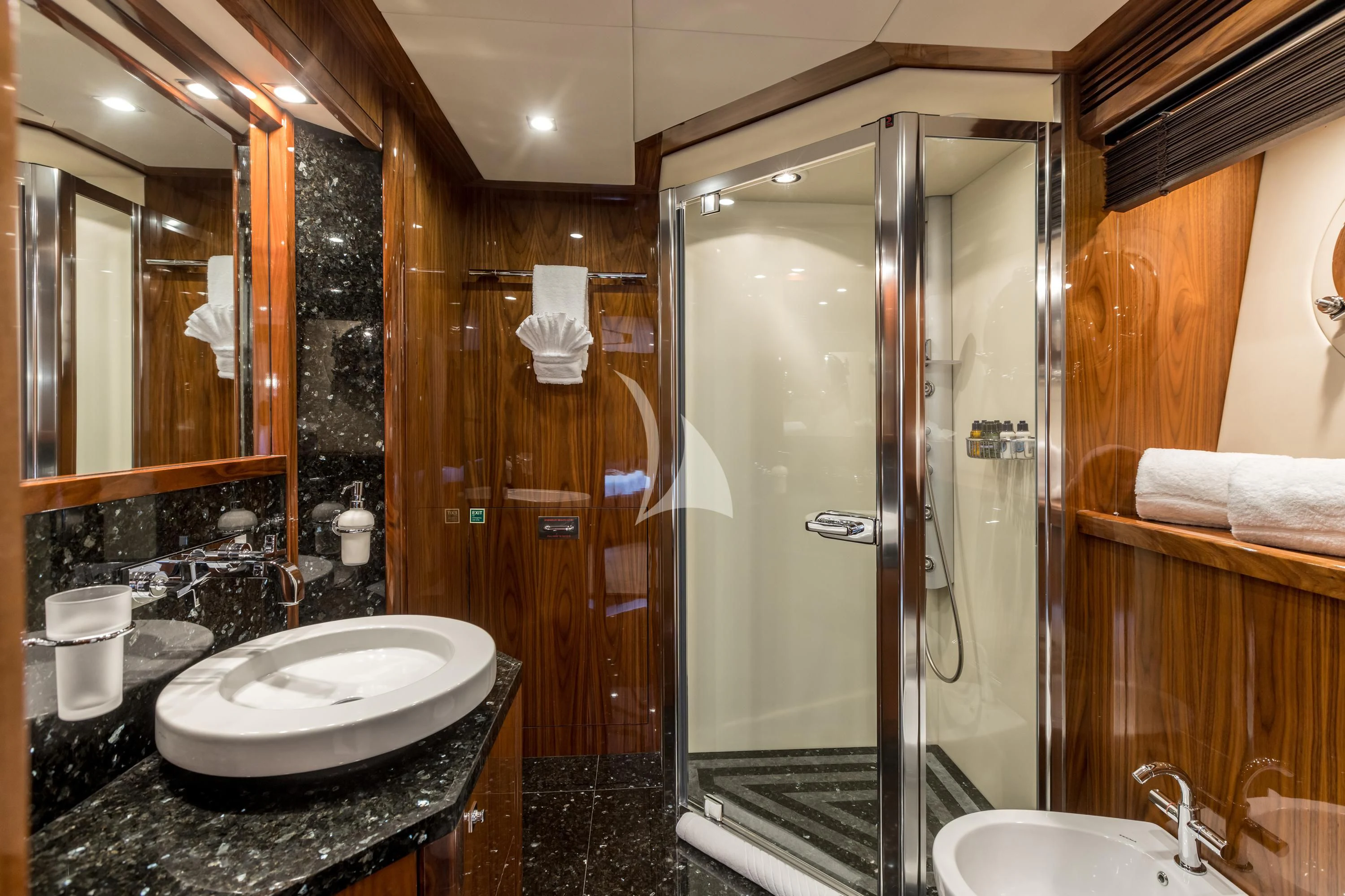 a bathroom with a glass shower aboard KATARIINA I Yacht for Sale