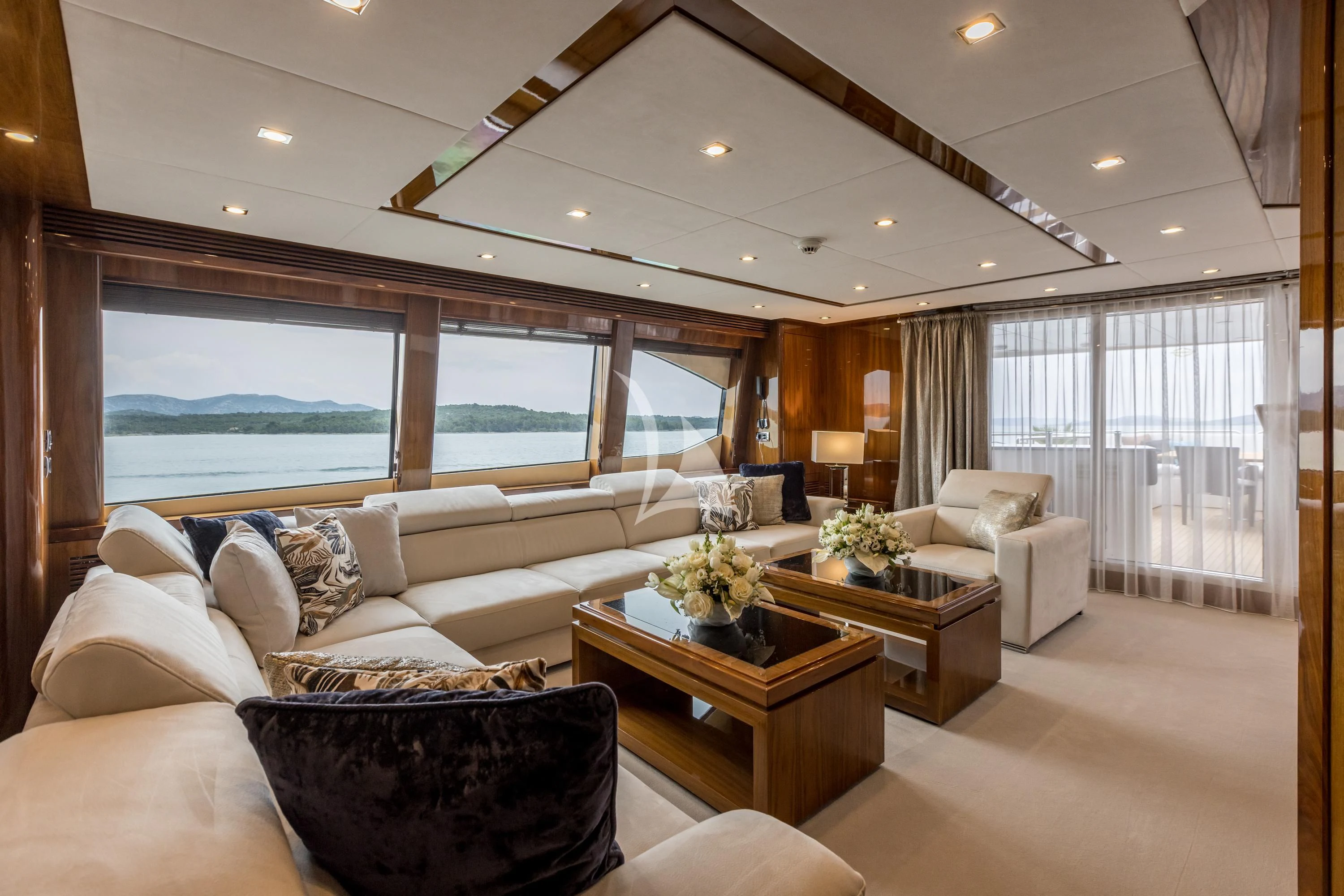 a living room with a large window aboard KATARIINA I Yacht for Sale