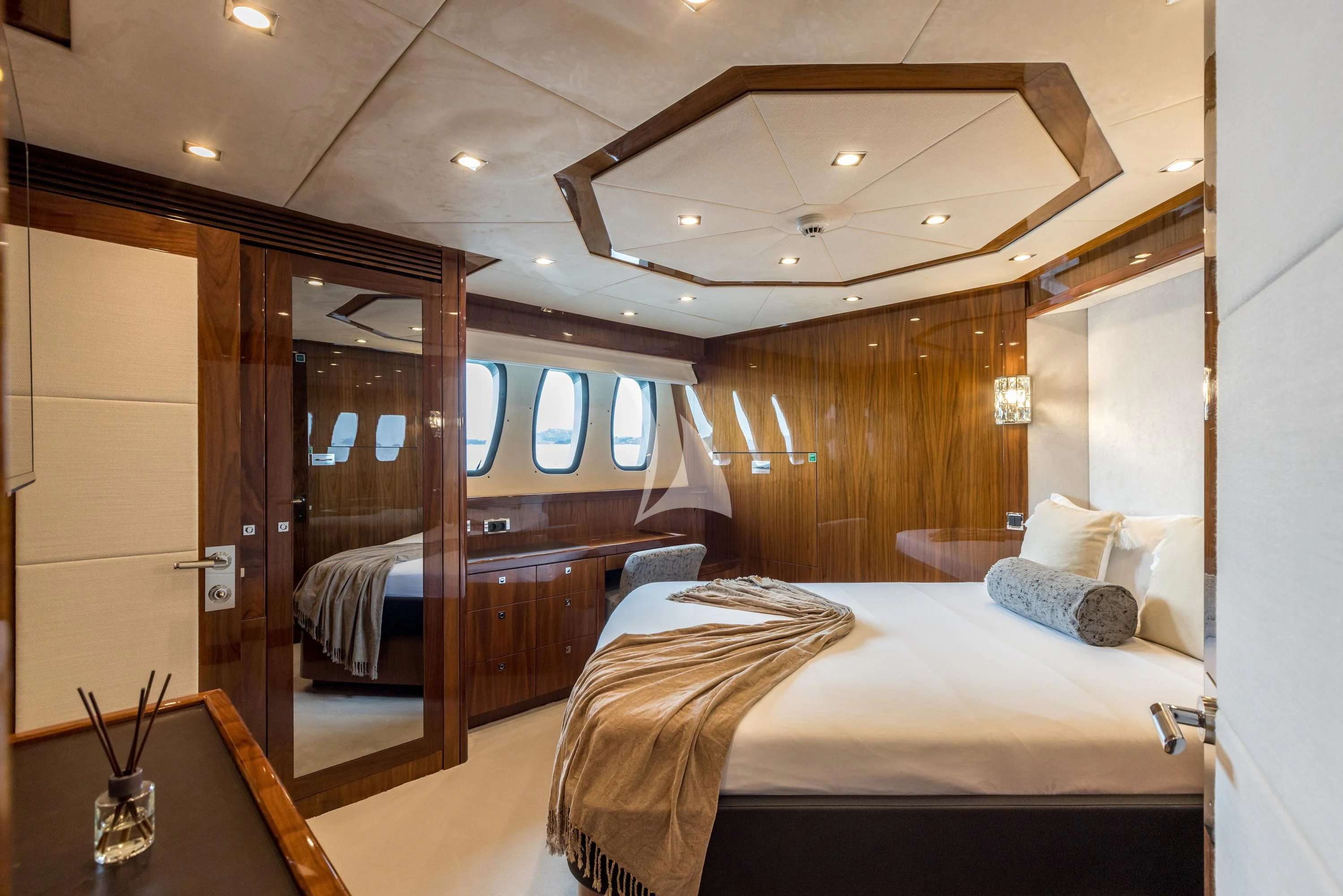 a room with a bed and a glass door aboard KATARIINA I Yacht for Sale