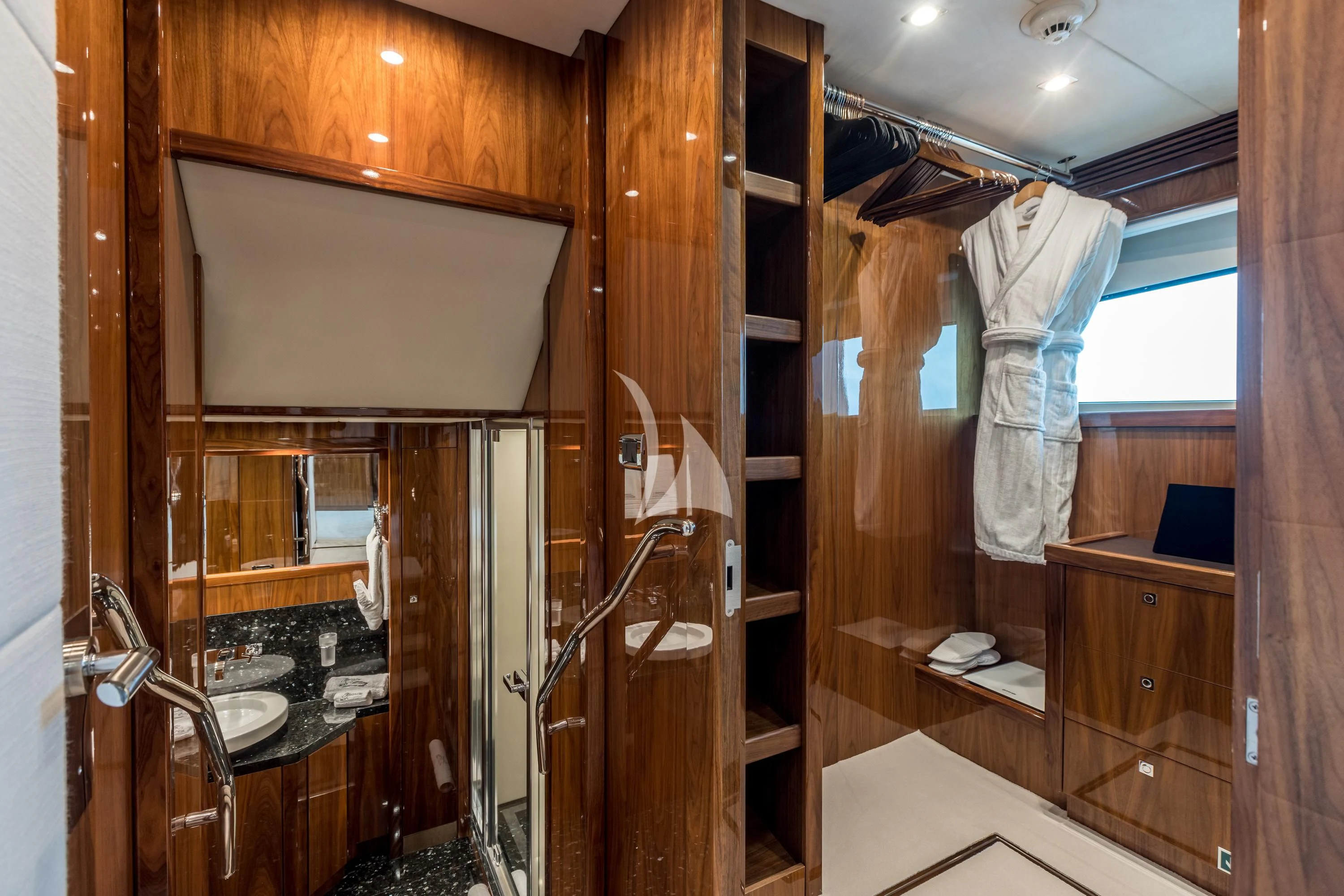 a bathroom with a mirror and a sink aboard KATARIINA I Yacht for Sale