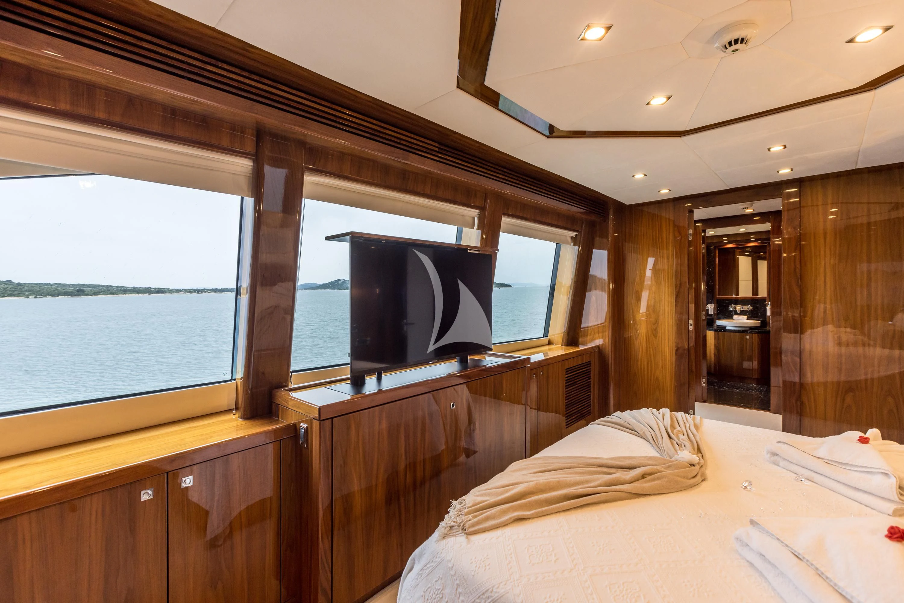 a room with a tv and a bed aboard KATARIINA I Yacht for Sale