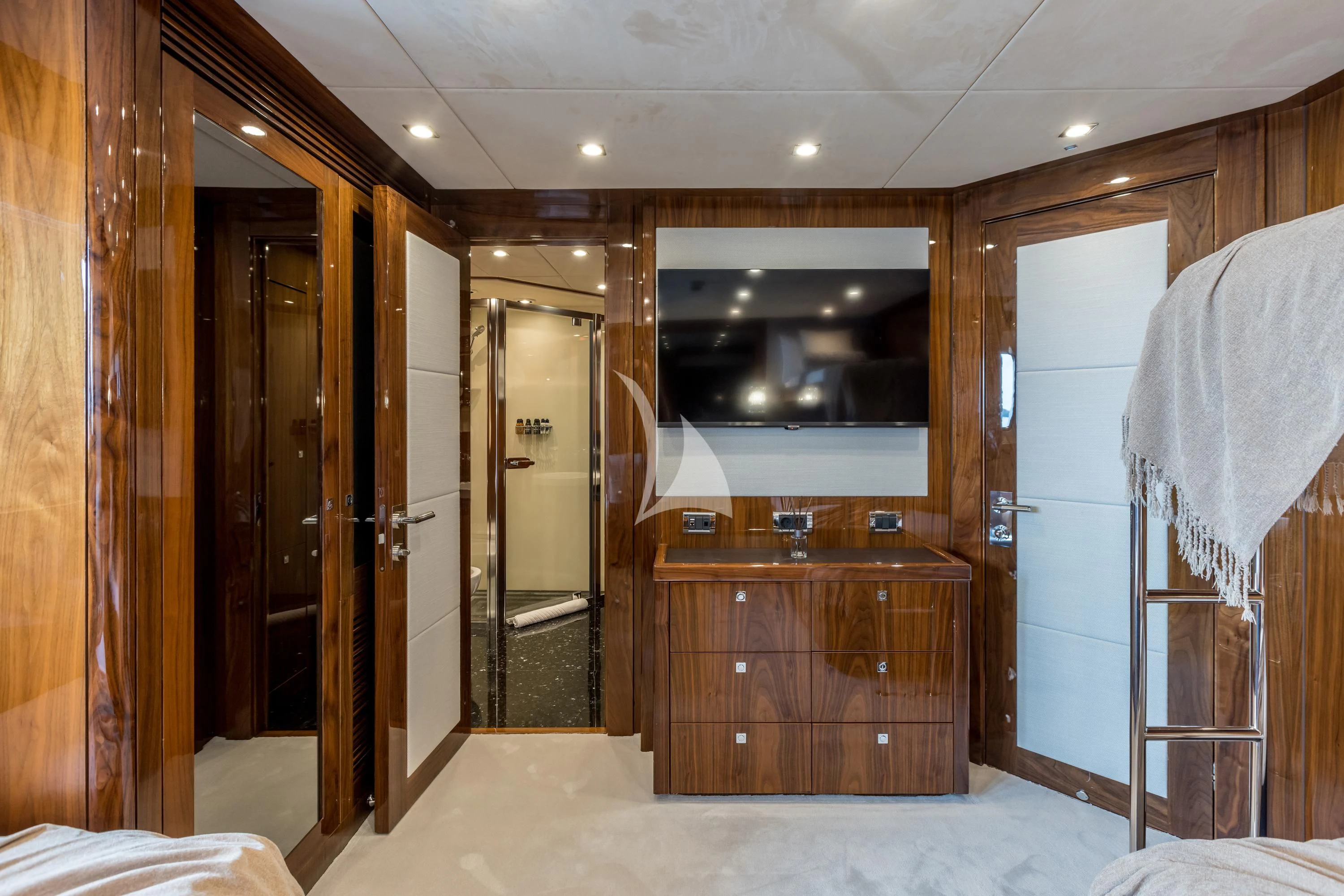 a room with a tv and a closet aboard KATARIINA I Yacht for Sale