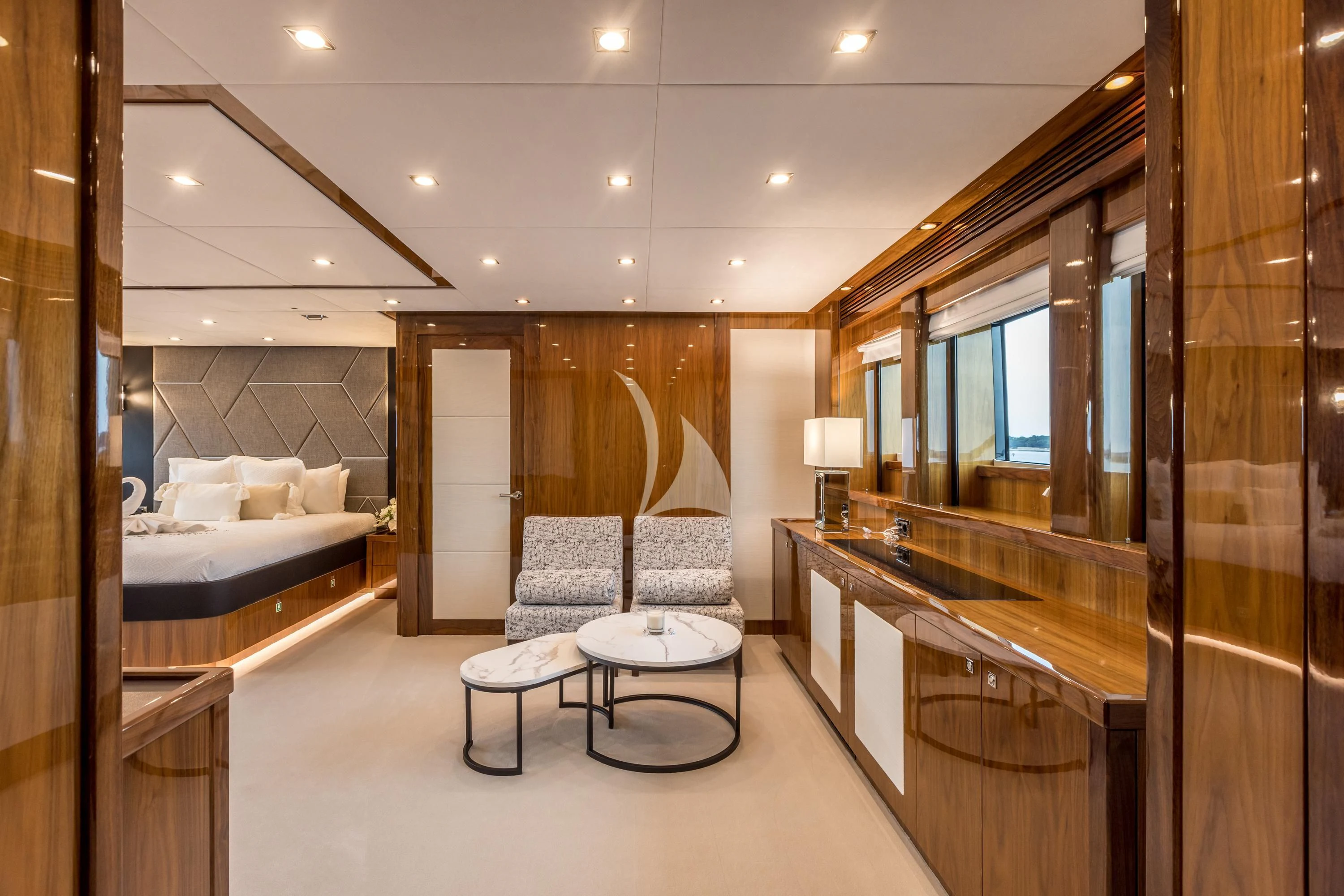 a room with a bed and a table aboard KATARIINA I Yacht for Sale