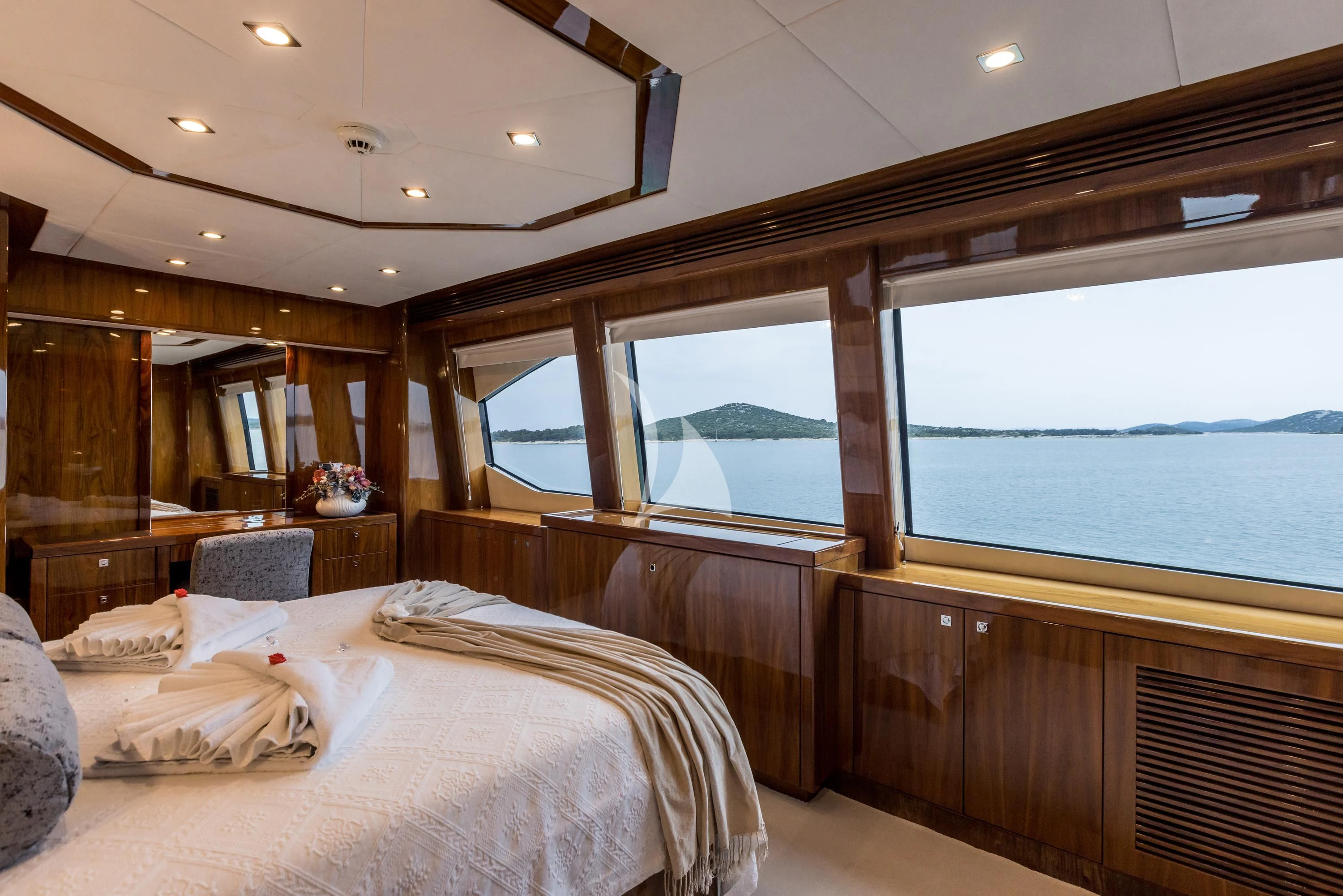 a room with a bed and a window aboard KATARIINA I Yacht for Sale