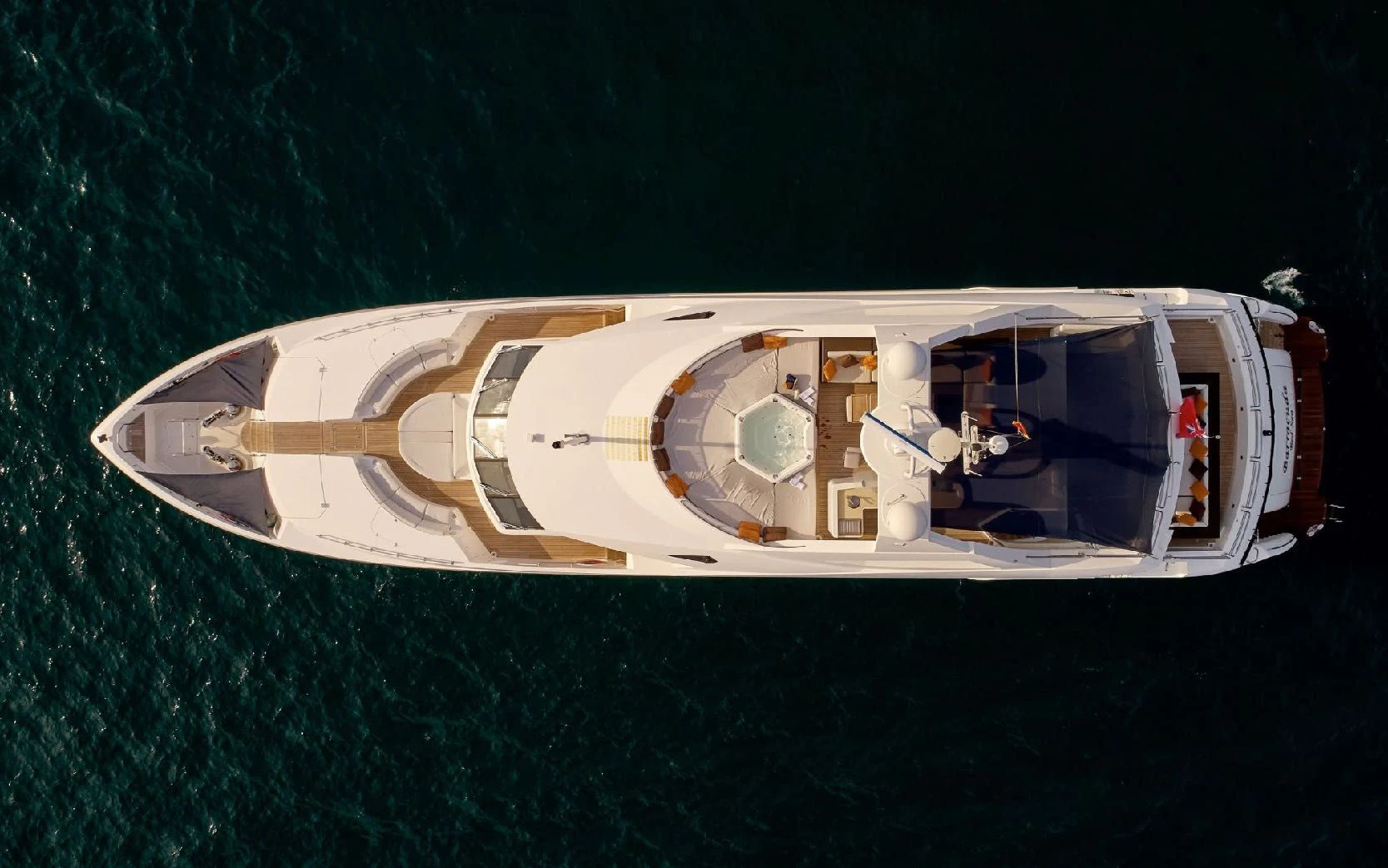 a white and gold boat on water aboard KATARIINA I Yacht for Sale