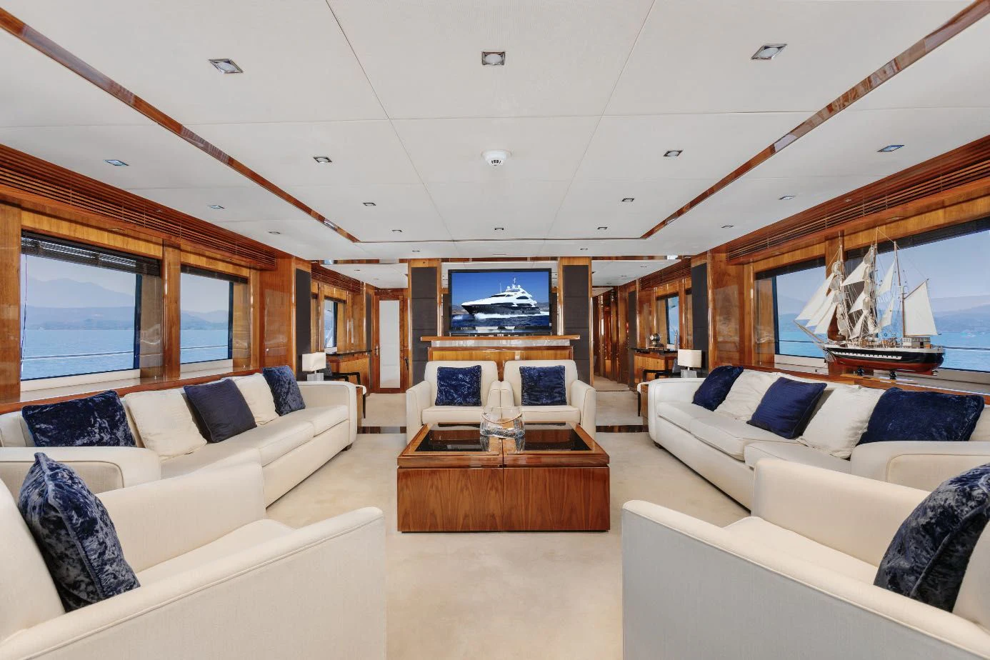 a living room with a large window aboard KATARIINA I Yacht for Sale