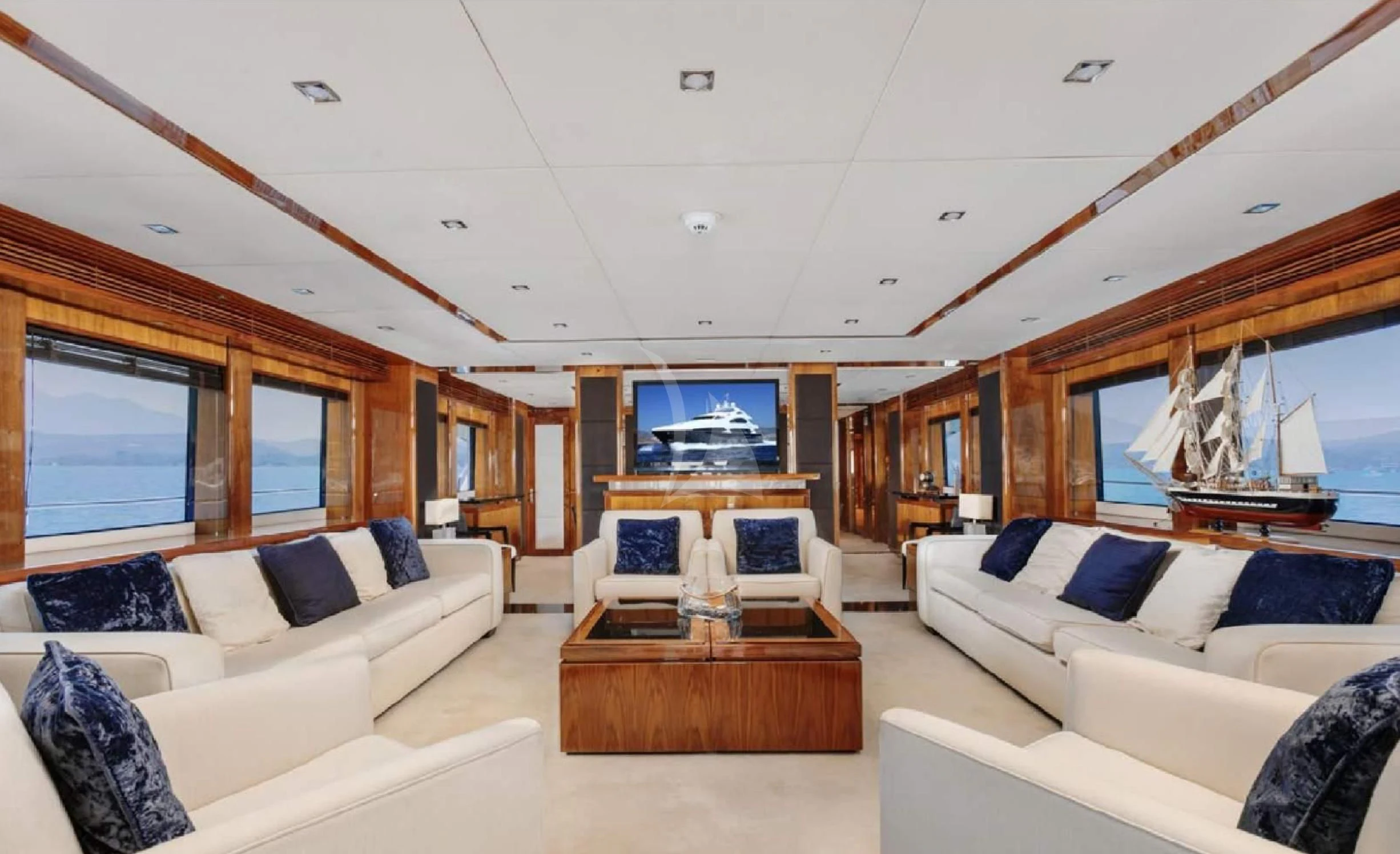a living room with a large window aboard KATARIINA I Yacht for Sale