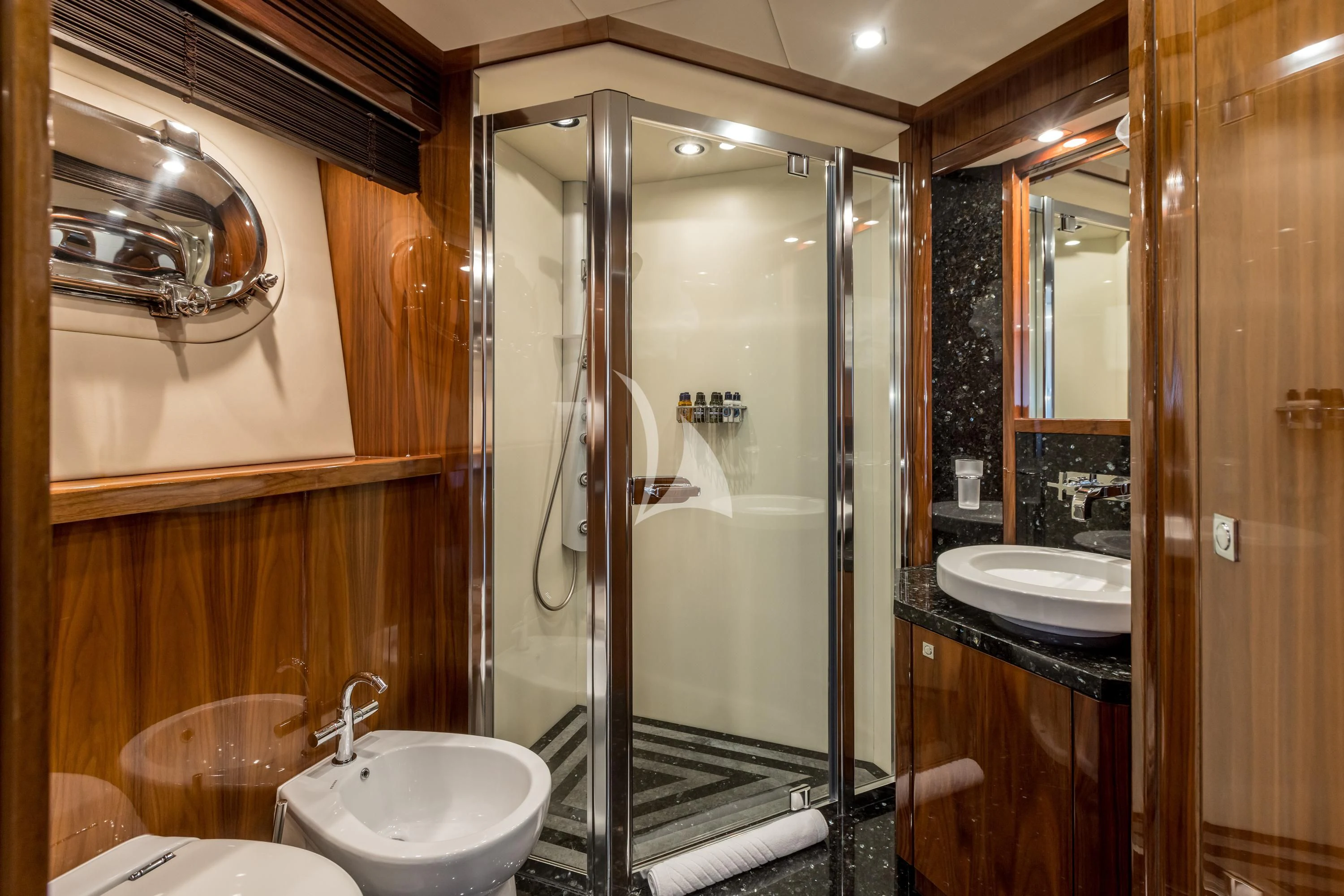 a bathroom with a glass shower aboard KATARIINA I Yacht for Sale