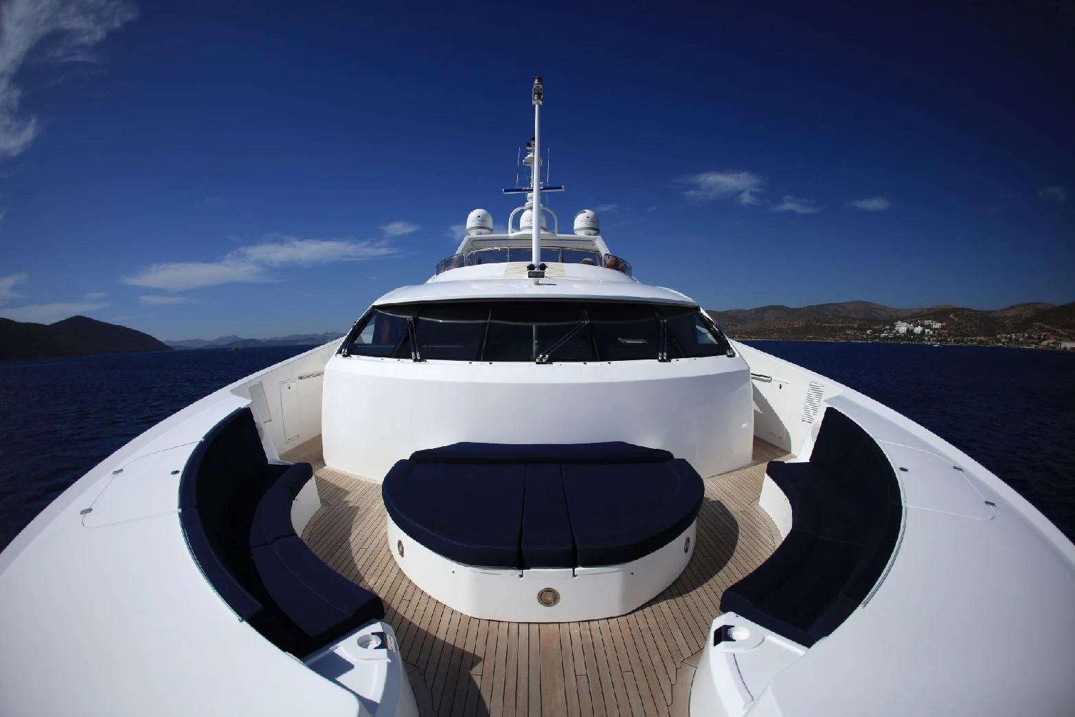 a white yacht on a beach aboard KATARIINA I Yacht for Sale