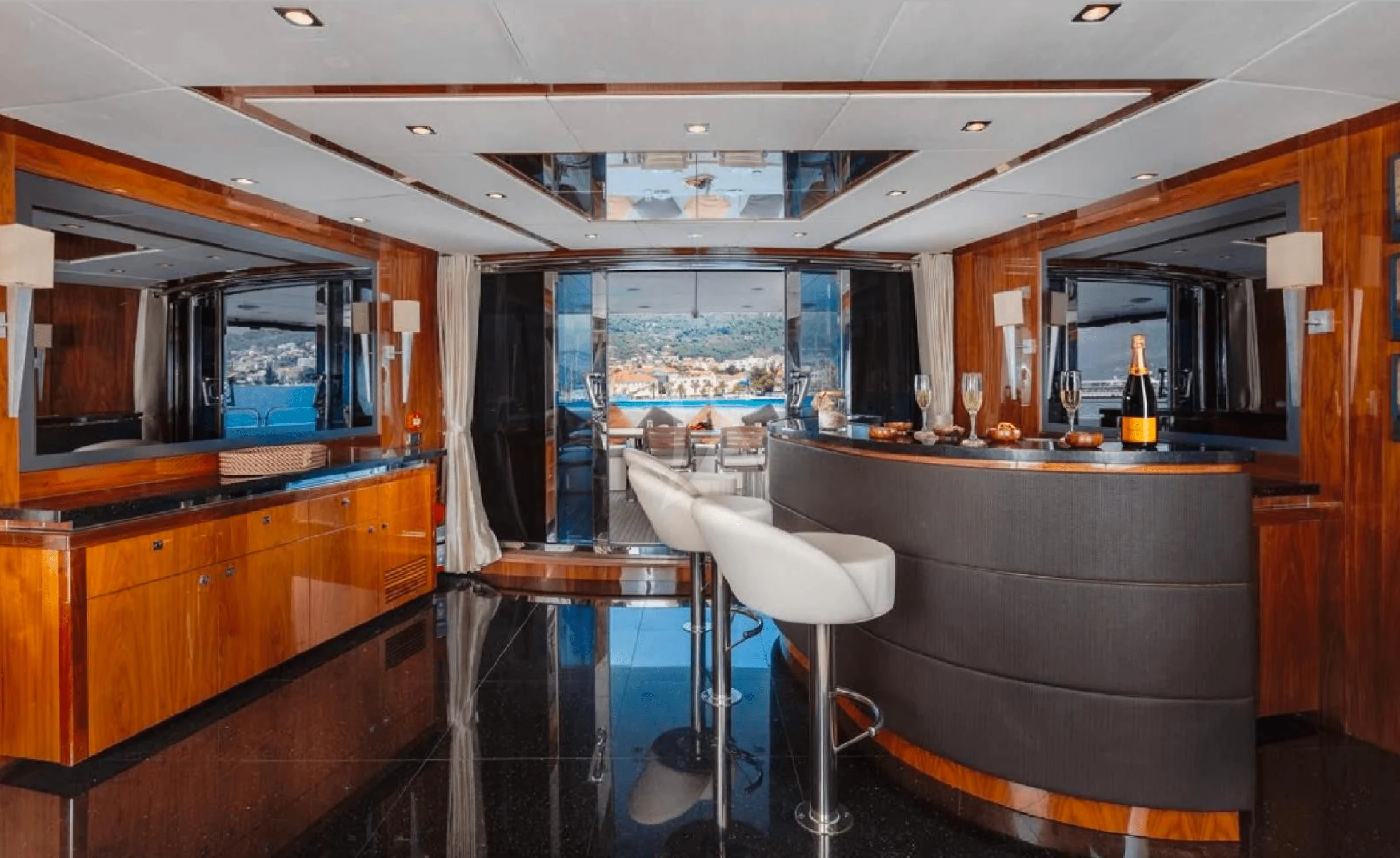 a kitchen with a bar and a bar aboard KATARIINA I Yacht for Sale