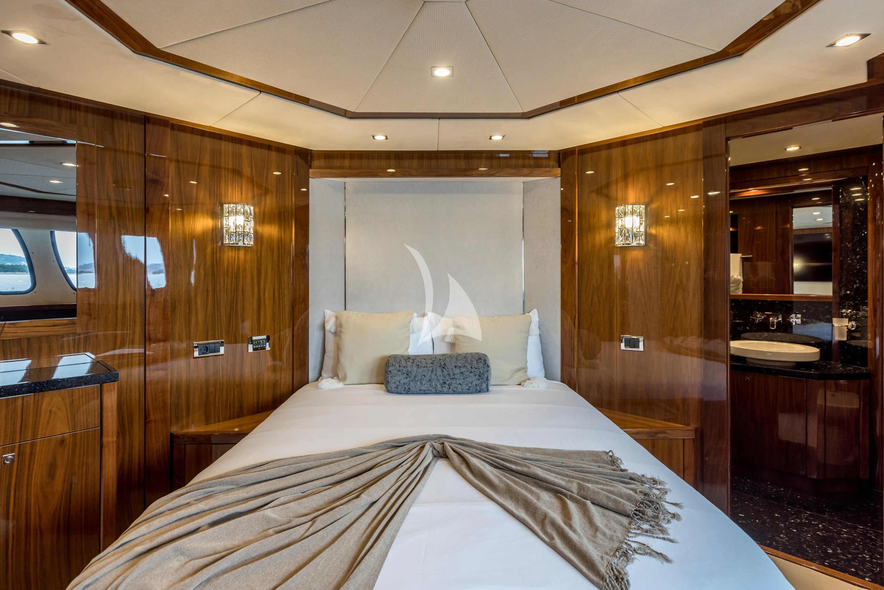 a bedroom with a large bed aboard KATARIINA I Yacht for Sale